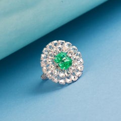 Cushion Cut Colombian Emerald Ring Surrounded by Fancy Rose Cut Diamonds in 18k