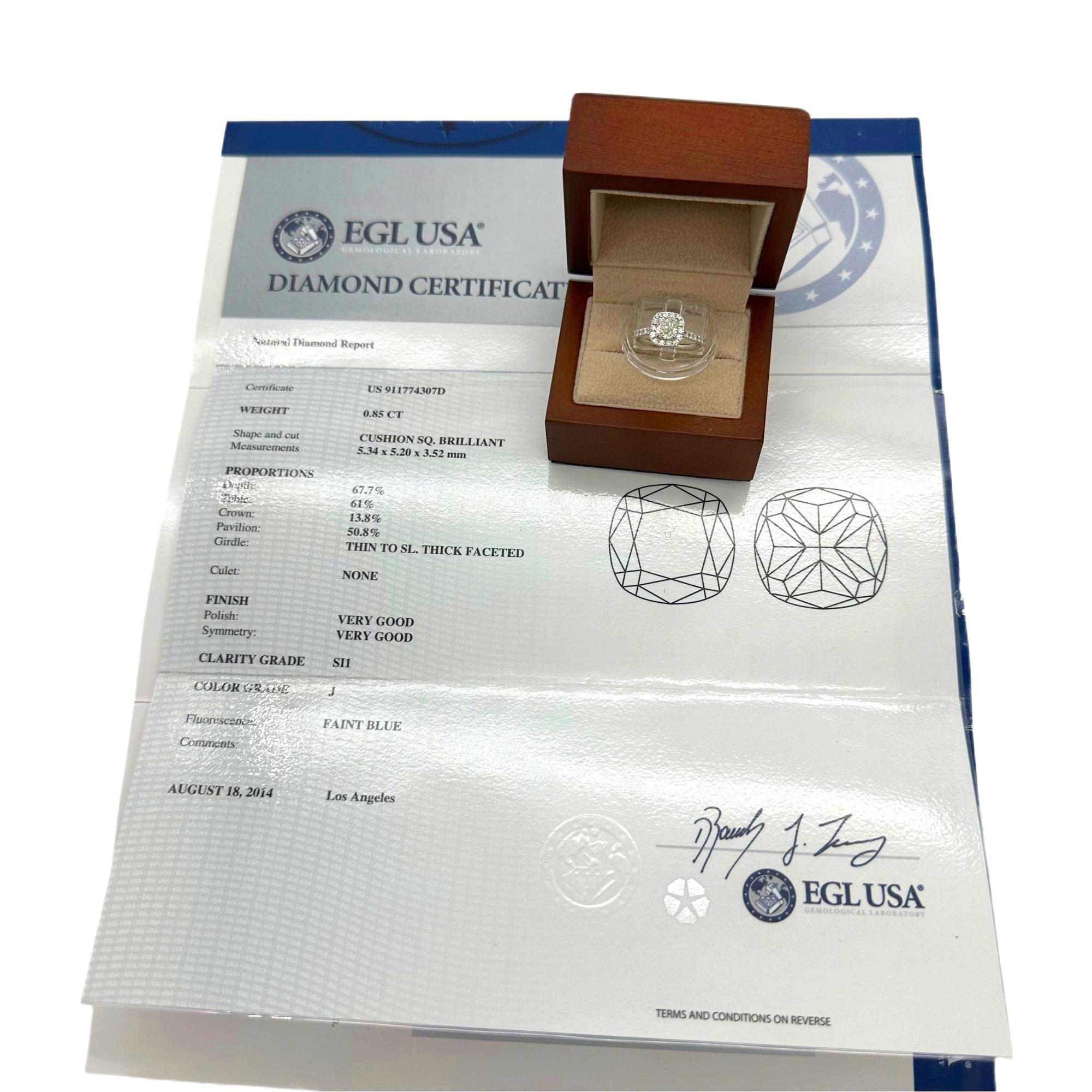 Cushion Cut Diamond Halo Engagement Ring
Style:  Halo with Accents
Ref. number:  EGL USA US 911774307D
Metal:  14K White Gold
Size / Measurements:  5.5 sizable
Main Diamond:  Cushion Cut Diamond 0.85 cts
Color & Clarity:  J, SI1
Accent Diamonds:  
