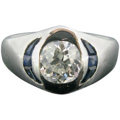 Cushion Cut Diamond and Sapphire Platinum Band Engagement Ring