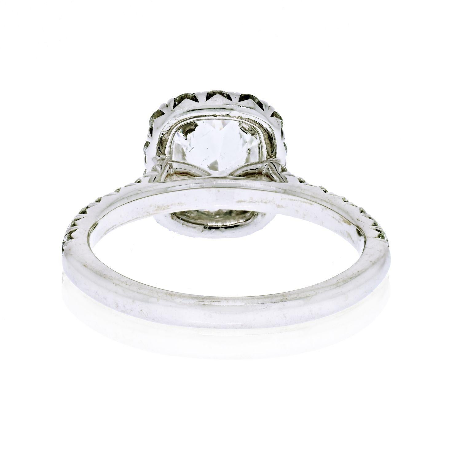 cushion cut halo diamond engagement ring in 18k white gold