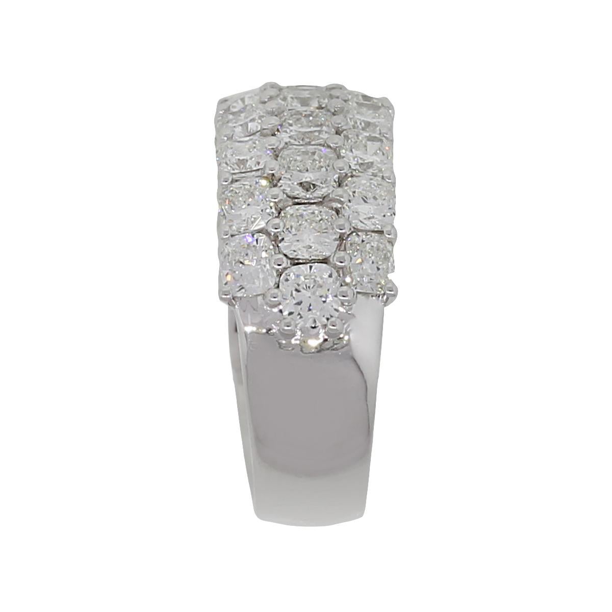 Material: 18k white gold
Diamond Details: Approximately 4.64ctw of Cushion cut diamonds. Diamonds are G/H in color and VS2-SI1 in clarity.
Size: 6.75
Total Weight: 9.6g (6.2dwt)
Measurements: 0.90″ x 0.40″ x 0.95″
SKU: A30312068