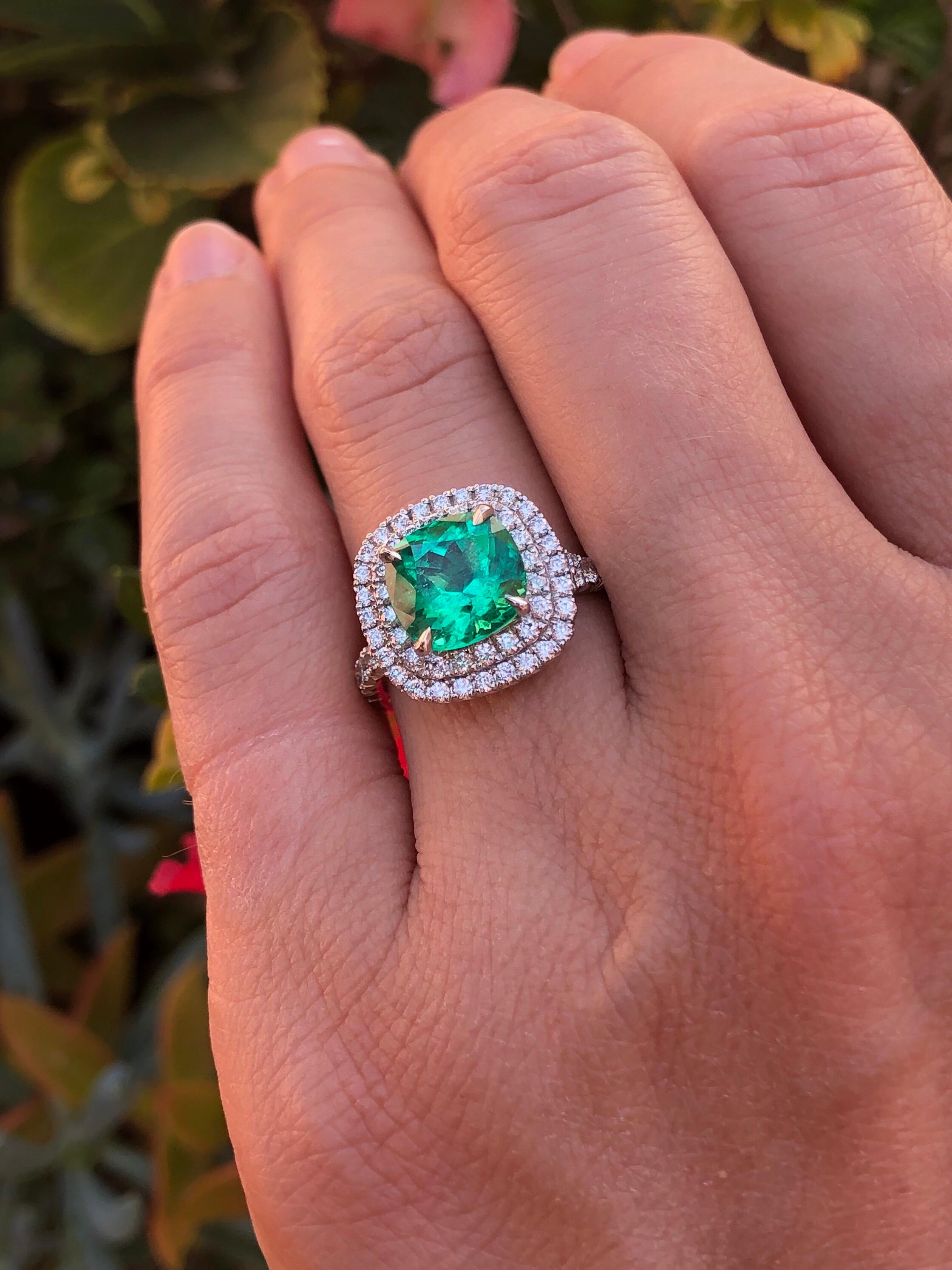 cushion cut emerald diamond ring