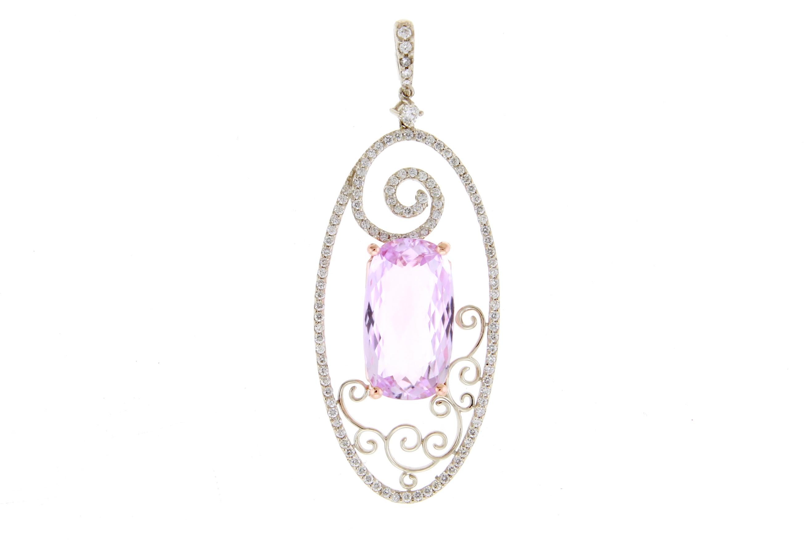 Material: 14k White Gold 
Center Stone Details: 9.22 Carat Cushion Cut Kunzite - 18 x 10 mm
Diamonds:  115 Round Diamonds at 0.74 Carats.  SI Quality /  H-I Color
Chain:  18 Inch

Fine one-of-a-kind craftsmanship meets incredible quality in this