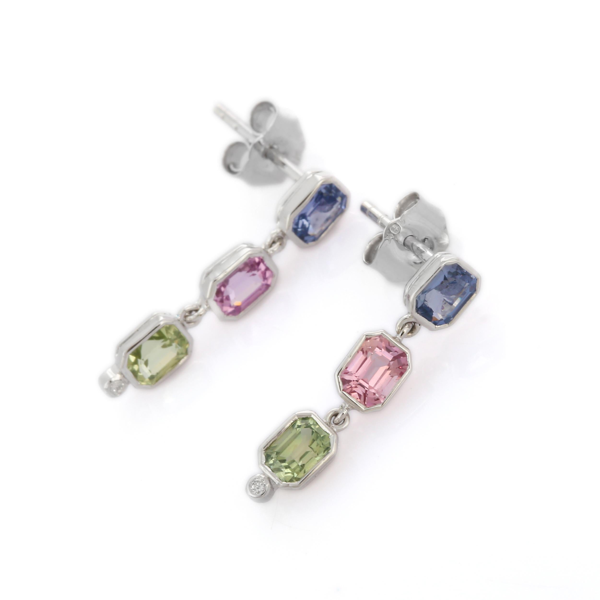 Multi sapphire dangle earrings to make a statement with your look. These earrings create a sparkling, luxurious look featuring cushion cut gemstone. These are a great bridesmaid, wedding or christmas gift for anyone on your list.
If you love to