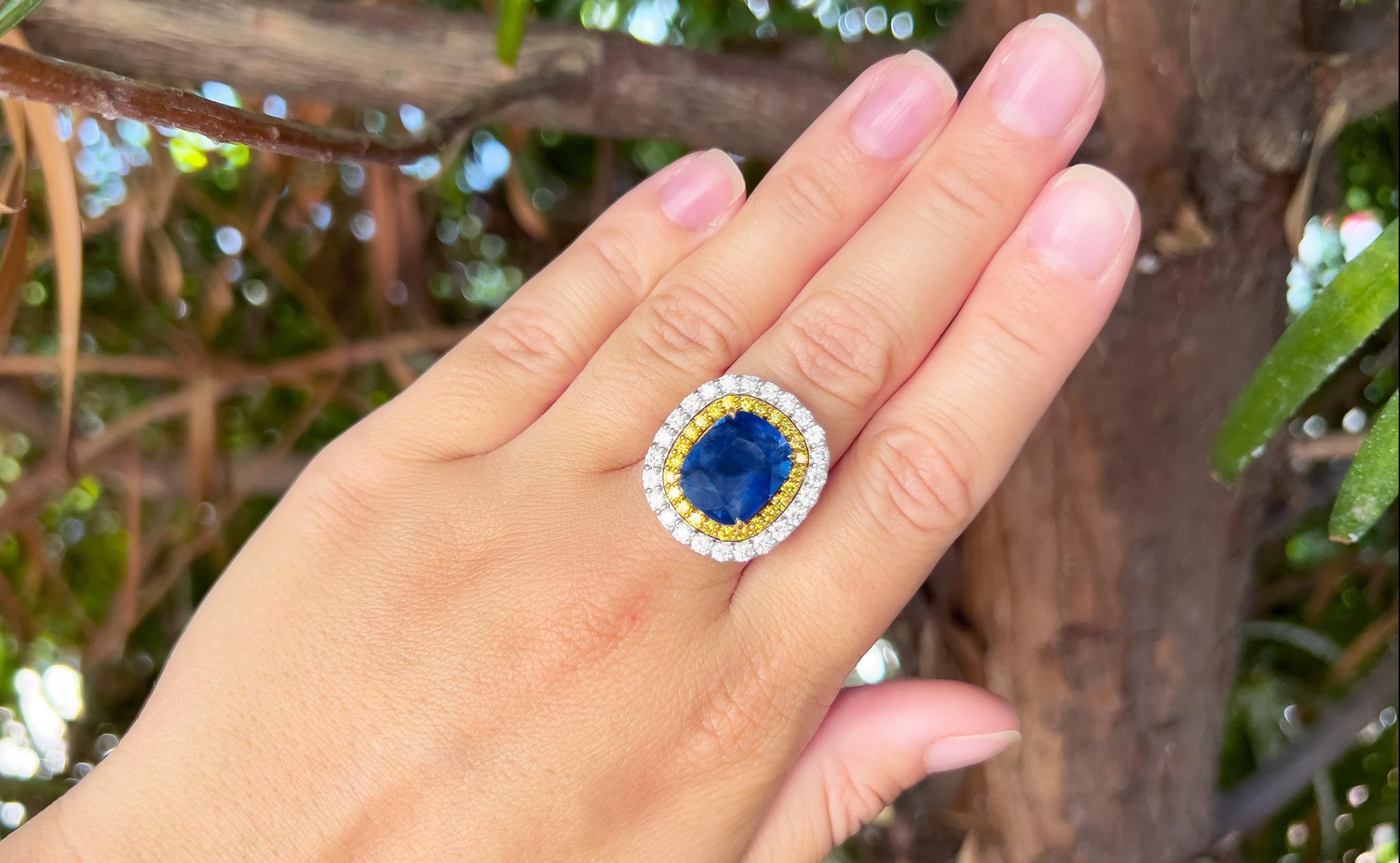 No Heat Sapphire = 18 Carat
Cut: Cushion
Canary Diamonds = 1.10 Carats
White Diamonds = 2.06 Carats
( Color: F, Clarity: VS )
Ring Size: 7.25* US
*It can be resized complimentary