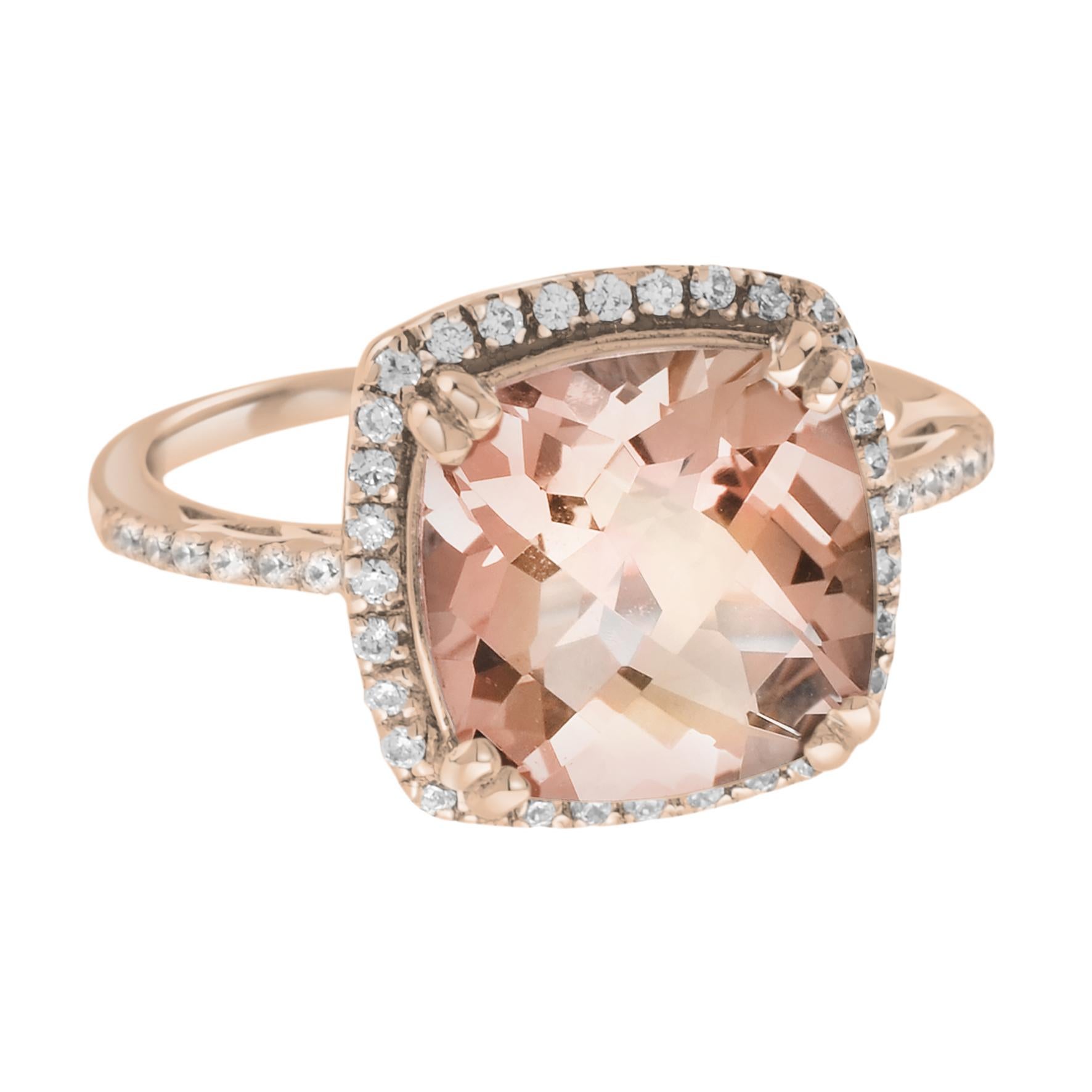 This elegant morganite and diamond halo style ring showcases a morganite stone set in a solid 18K gold setting. This precious stone is accented by 46 brilliant cut white round diamonds in a halo fashion.
Ring Information
Metal: 18K Rose Gold
Weight: