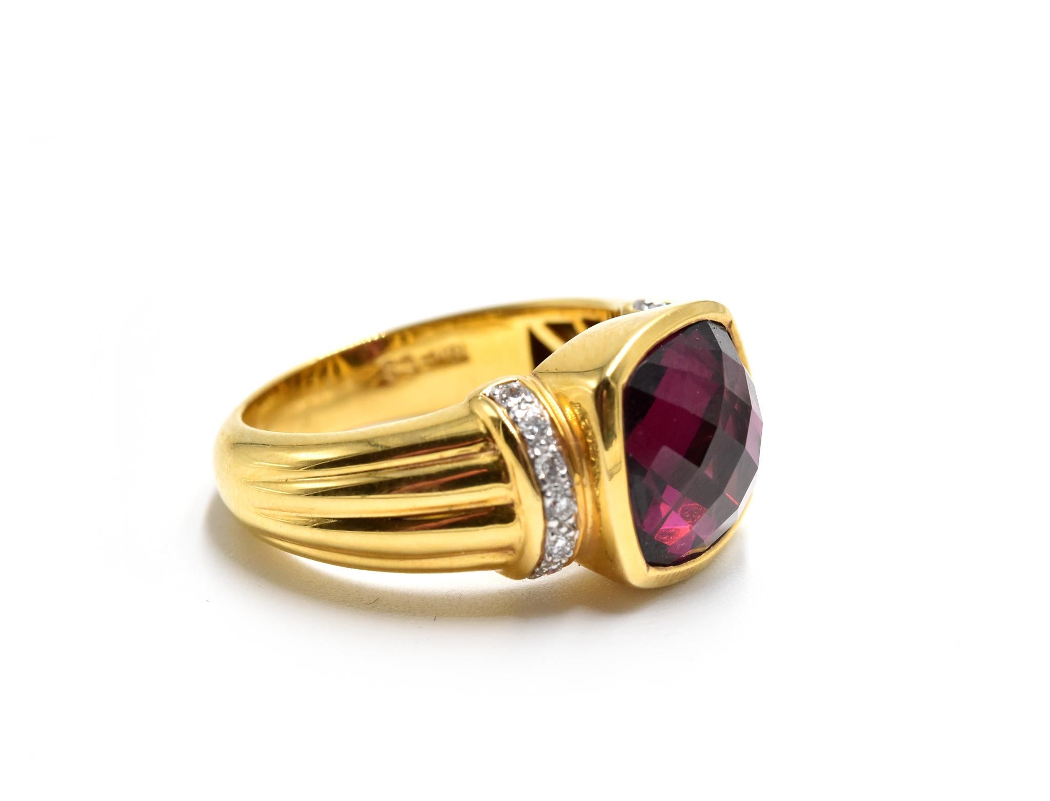 Designer: custom design
Material: 18k yellow gold
Rhodolite Garnet: cushion cut 4.60 carat rhodolite garnet gemstone
Diamonds: 0.16 carat weight
Dimensions: ring top measures 3/4-inch long
Ring Size: 6 (please allow two additional shipping days for