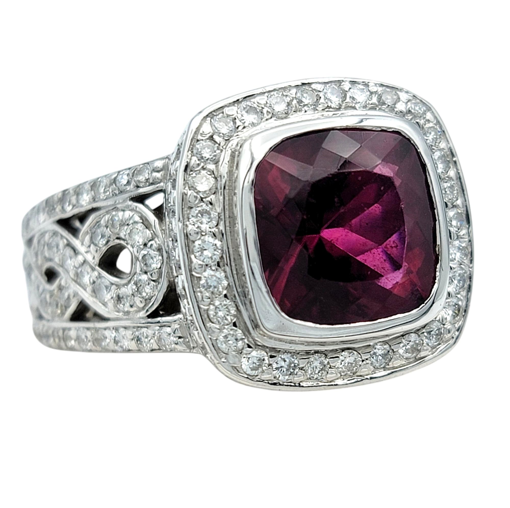 Ring Size: 8.5 

Step into the spotlight with this breathtaking rubellite tourmaline cocktail ring, a dazzling blend of bold color and timeless elegance. The centerpiece is a vibrant cushion-cut rubellite tourmaline, radiating rich raspberry hues