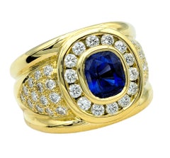 Cushion Cut Blue Sapphire and Diamond Halo Wide Band Ring 18 Karat Yellow Gold