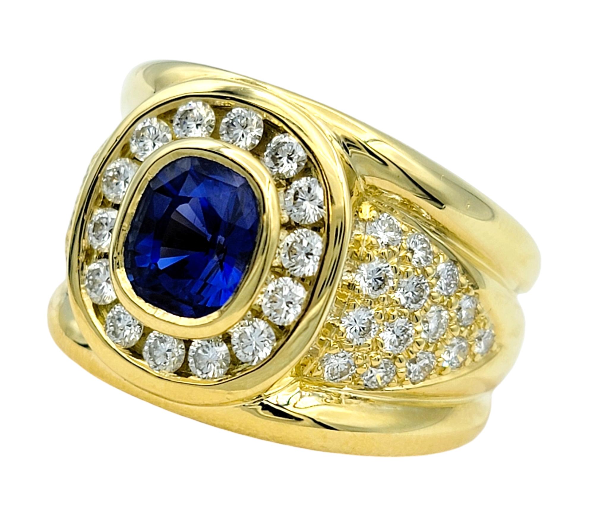 Contemporary Cushion Cut Sapphire and Diamond Halo Wide Band Ring in 18 Karat Yellow Gold For Sale