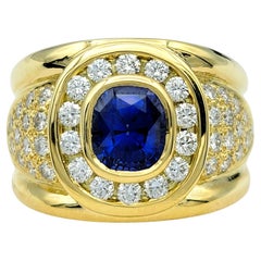 Cushion Cut Sapphire and Diamond Halo Wide Band Ring in 18 Karat Yellow Gold