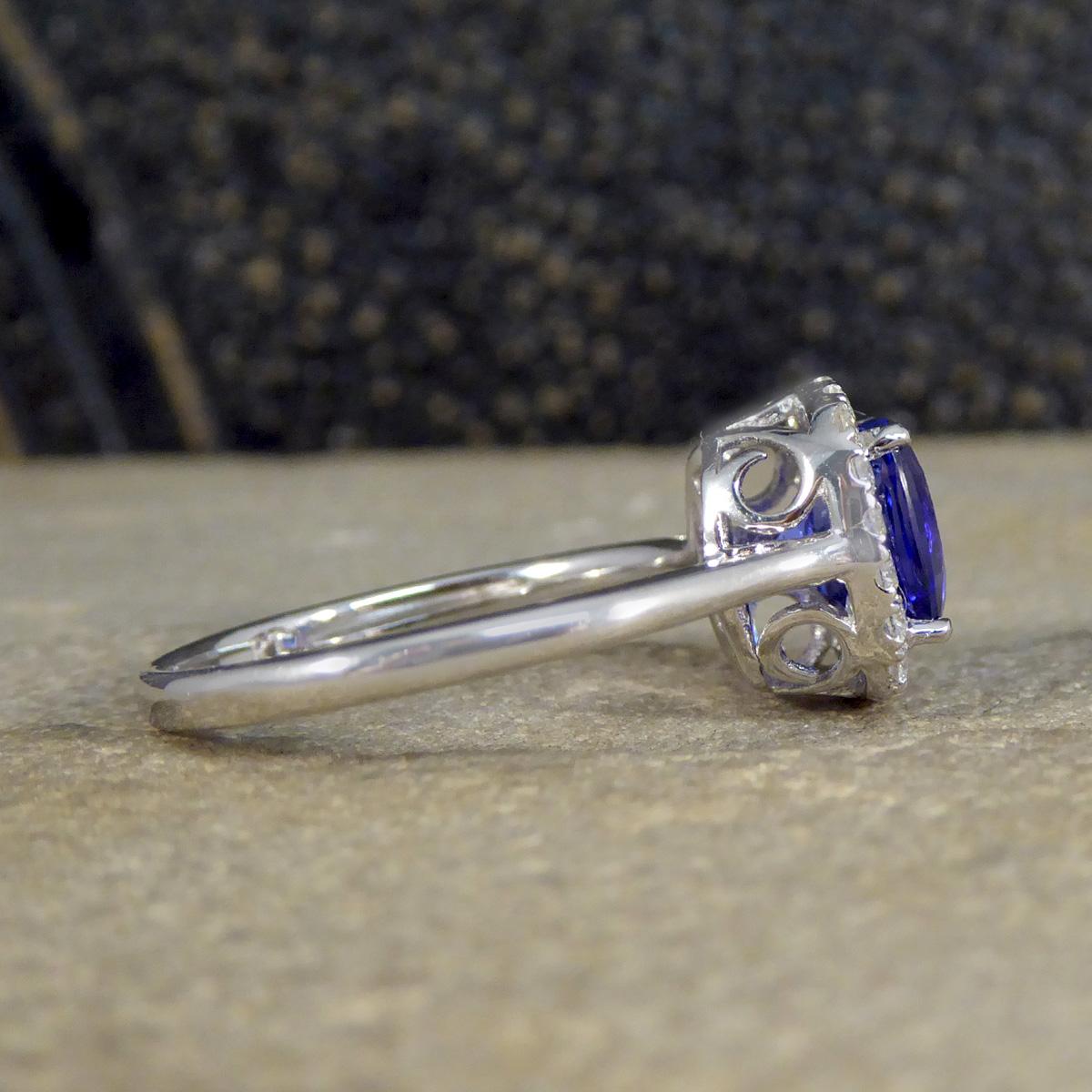 Modern Cushion Cut Tanzanite and Diamond Cluster Ring in White Gold For Sale