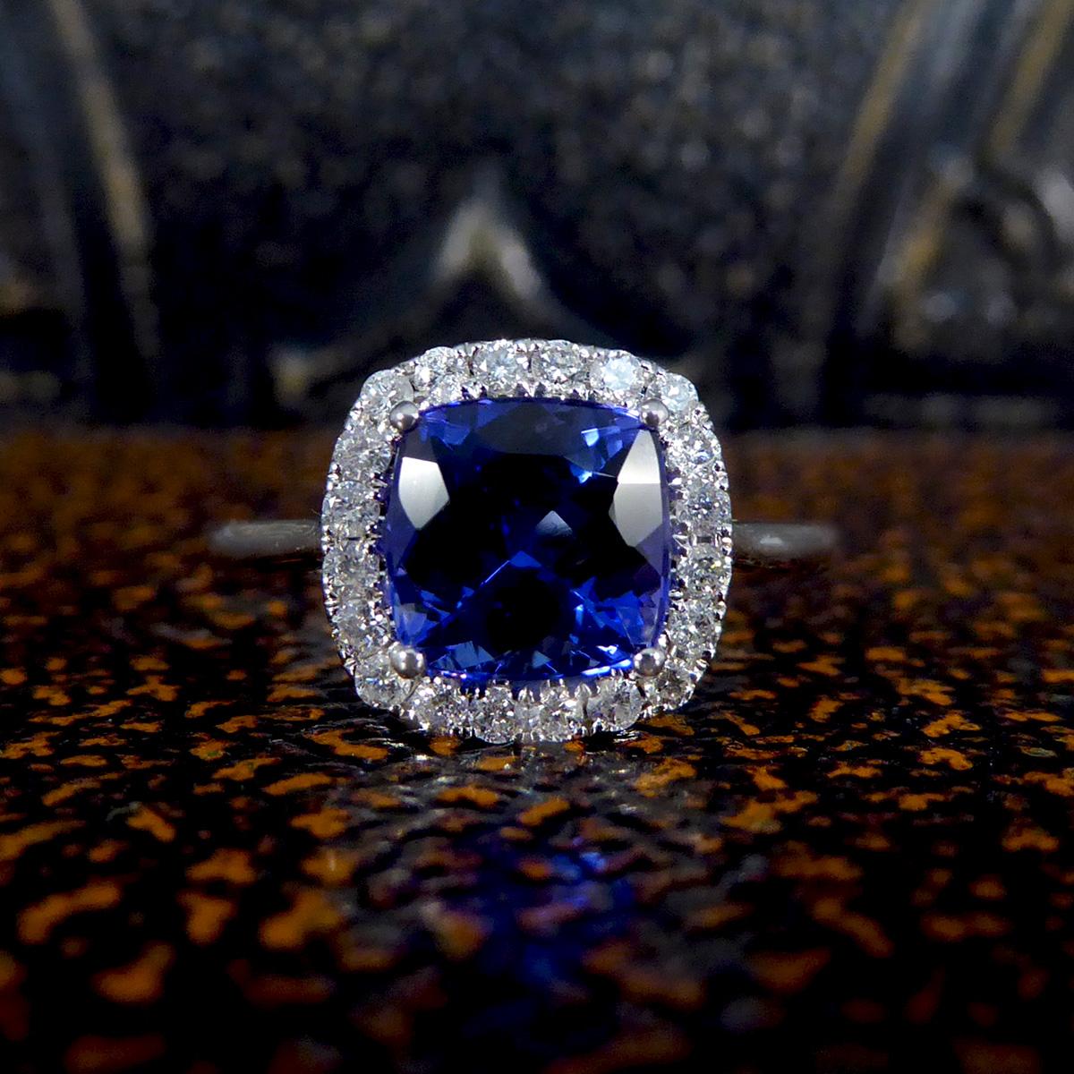 Cushion Cut Tanzanite and Diamond Cluster Ring in White Gold For Sale 2