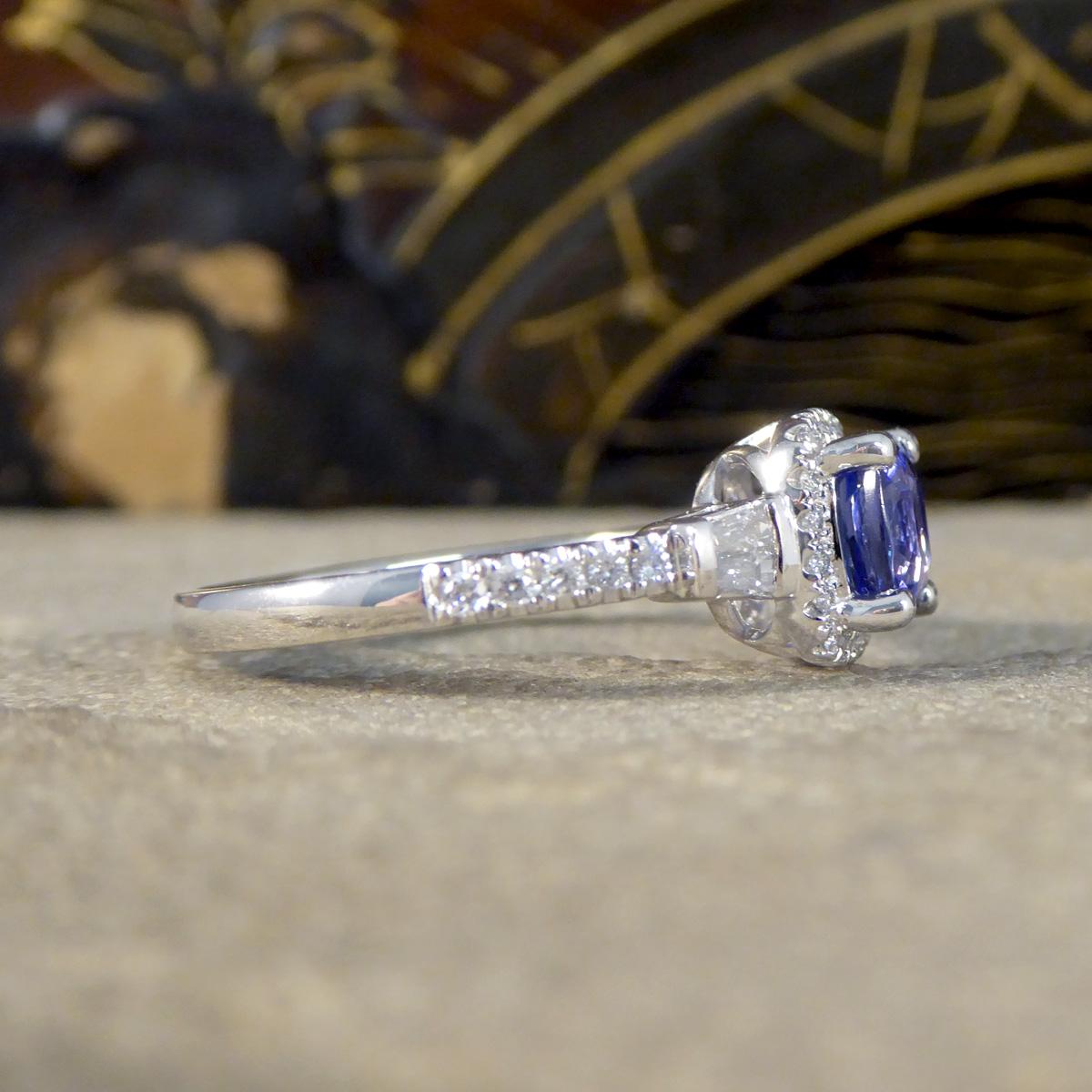 Modern Cushion Cut Tanzanite and Diamond Cluster Ring with Tapered Baguette Shoulders i For Sale