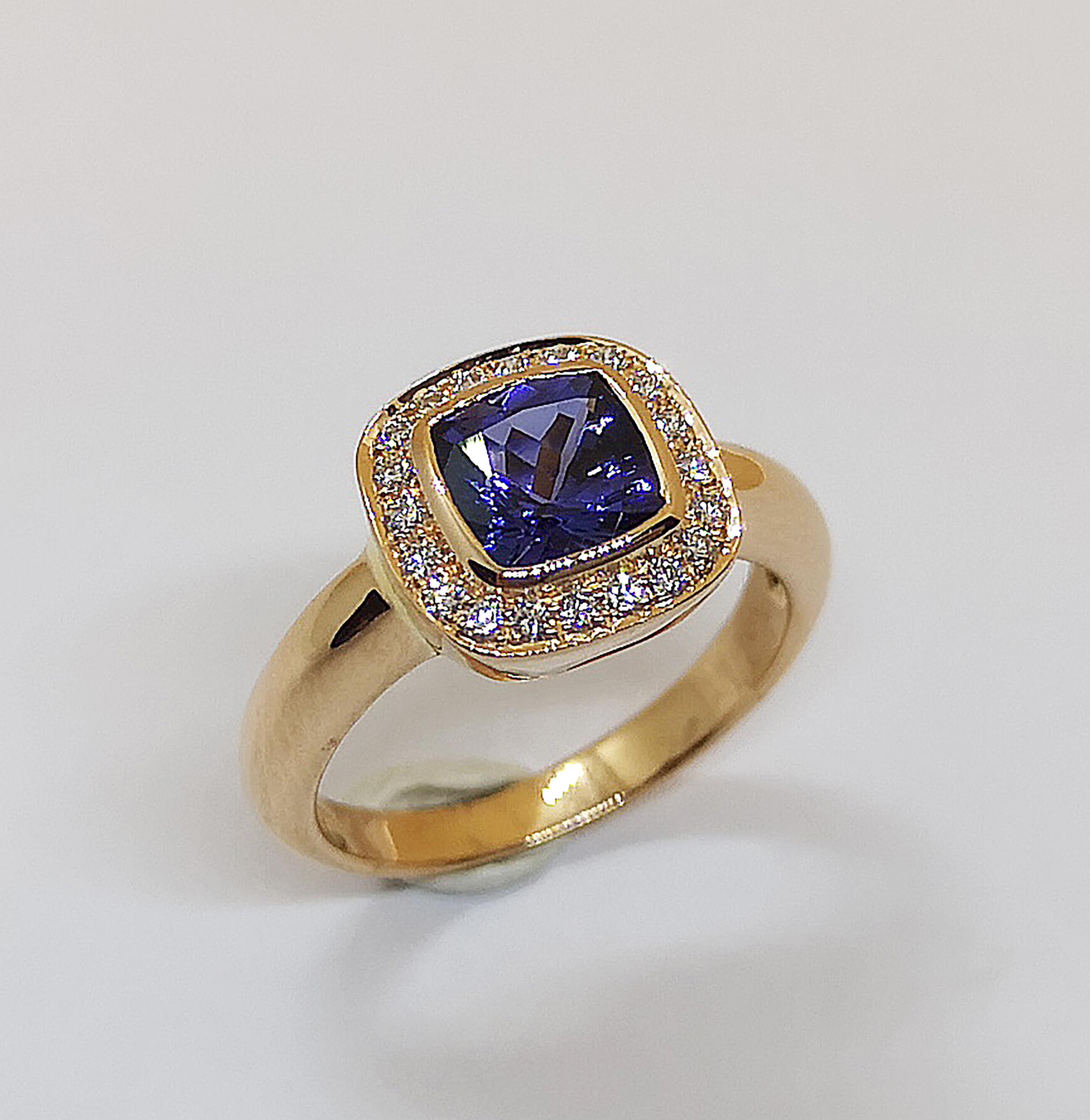 Tanzanite 1.45 carats with Diamond 0.16 carat Ring set in 18 Karat Rose Gold Settings 

Width:  1.0 cm 
Length: 1.0 cm
Ring Size: 52
Total Weight: 5.33 grams

