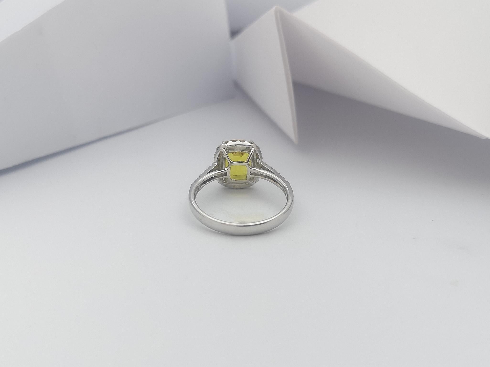 Cushion Cut Yellow Sapphire with Diamond Halo Ring Set in 18 Karat White Gold For Sale 2