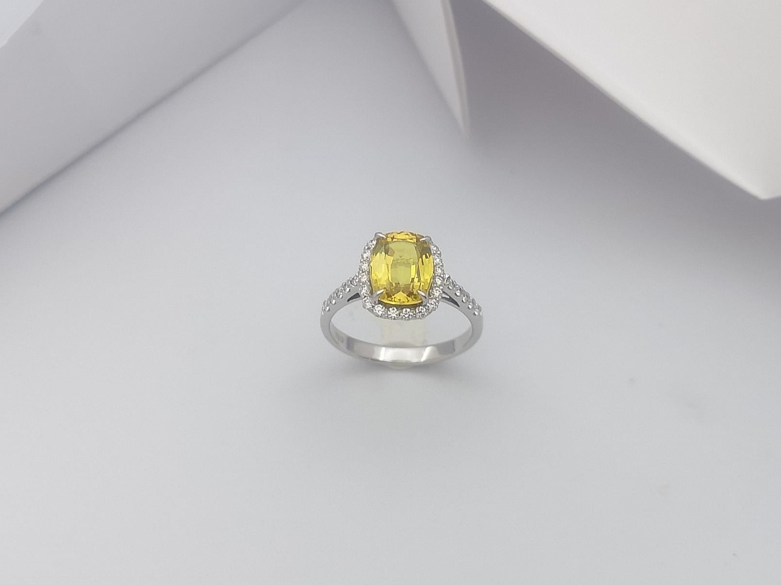 Cushion Cut Yellow Sapphire with Diamond Halo Ring Set in 18 Karat White Gold For Sale 4