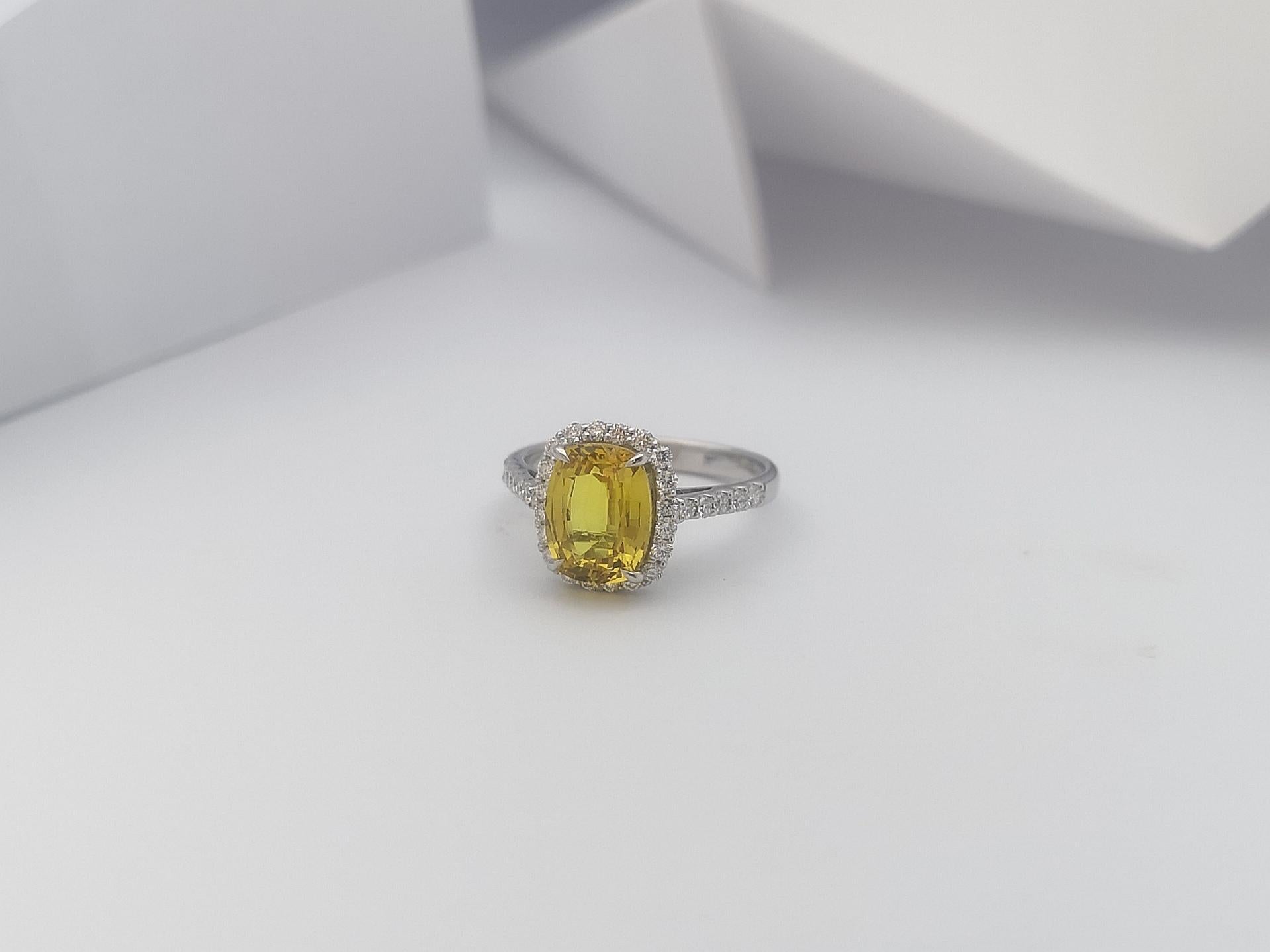 Women's Cushion Cut Yellow Sapphire with Diamond Halo Ring Set in 18 Karat White Gold For Sale