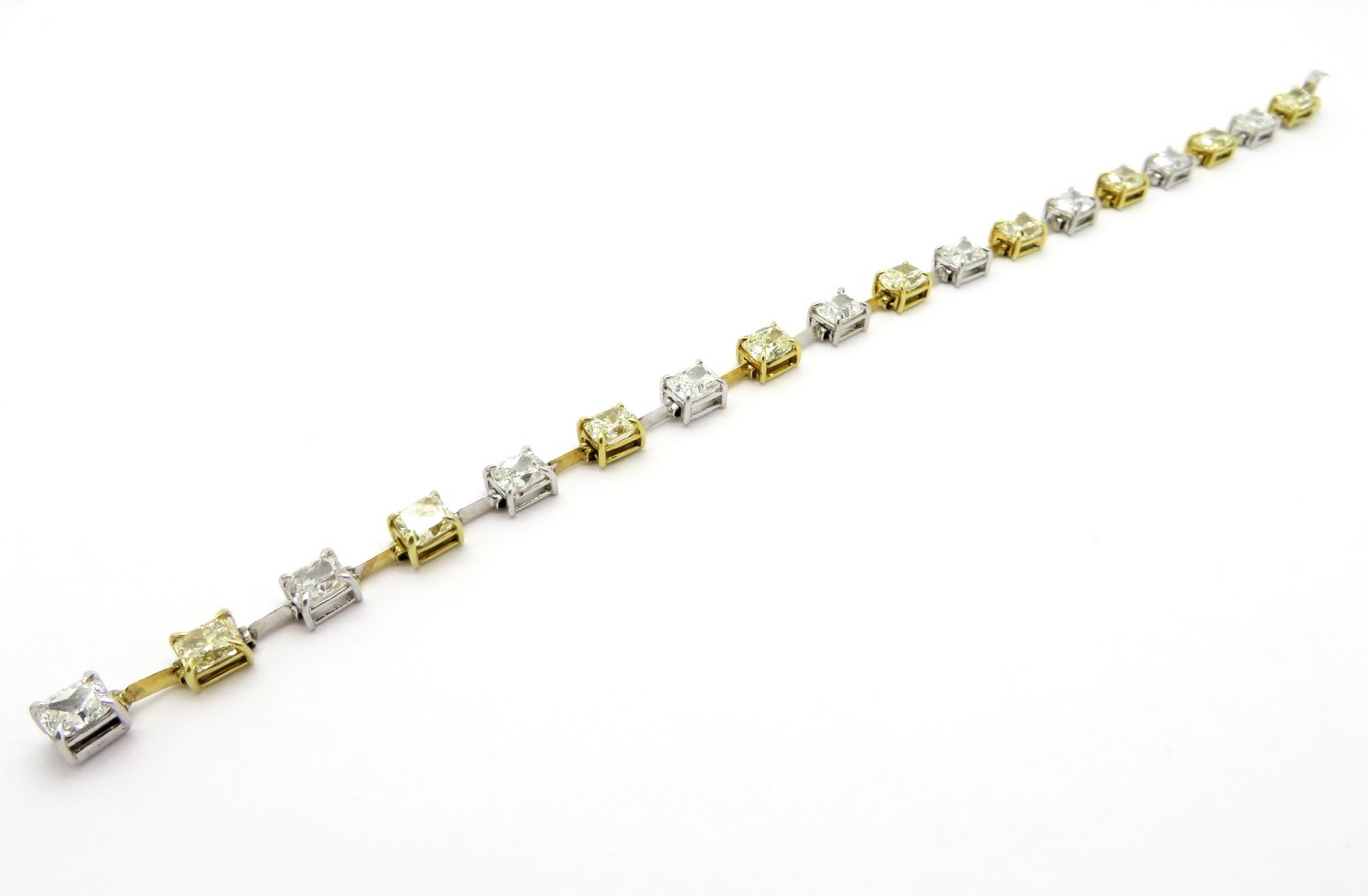 Platinum and 18K yellow and white gold cushion cut diamond fashion tennis bracelet. Showcasing nine cushion cut diamonds weighing approximately 4.92 carats having fancy yellow color and VS1 clarity. Interspersed with nine cushion cut diamonds