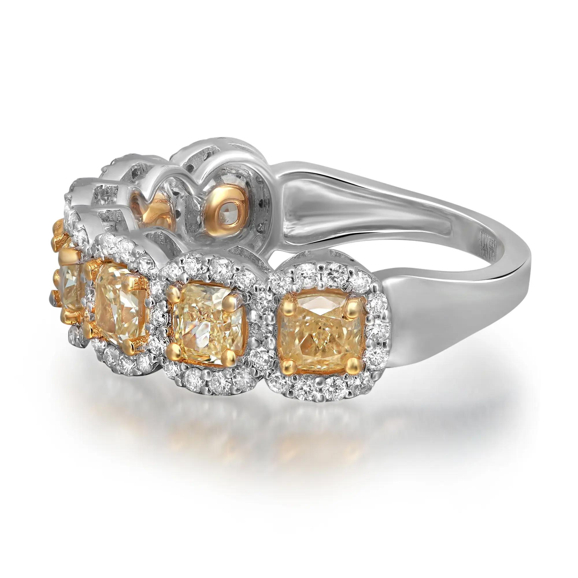 Este precioso anillo de media eternidad tiene 7 diamantes amarillos talla cojín engastados con un contorno de diamantes blancos talla brillante redondos. Fabricada en oro blanco de 14 quilates con puntas de oro amarillo. Peso total del diamante:
