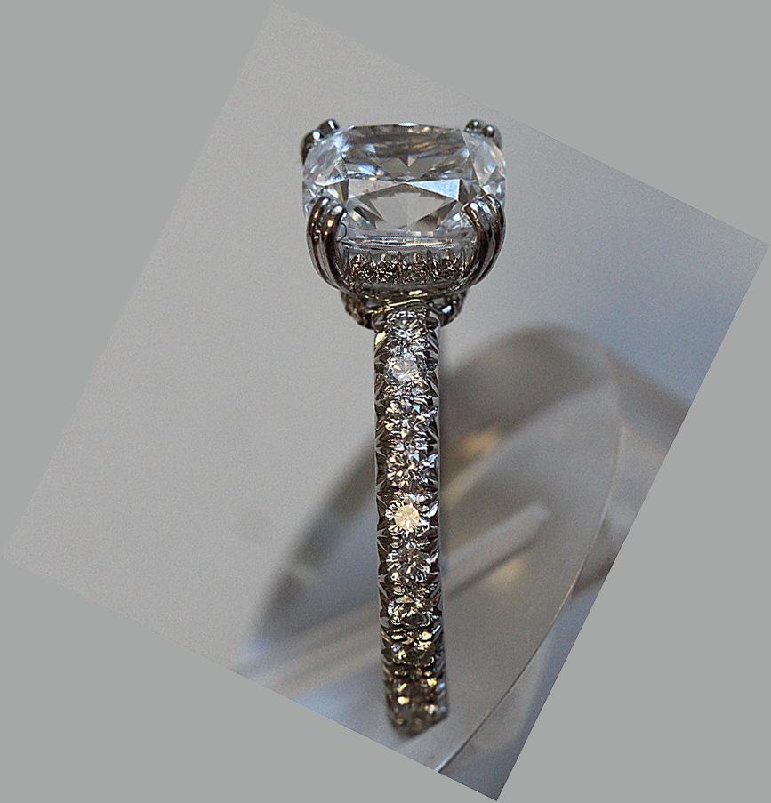Ring can be purchased without the center stone. I can supply a different center stone to fit your budget if it is higher or lower.
If already sold ring will be made to order and take approximately 3-6 business weeks.


Center Stone Diamond Details :