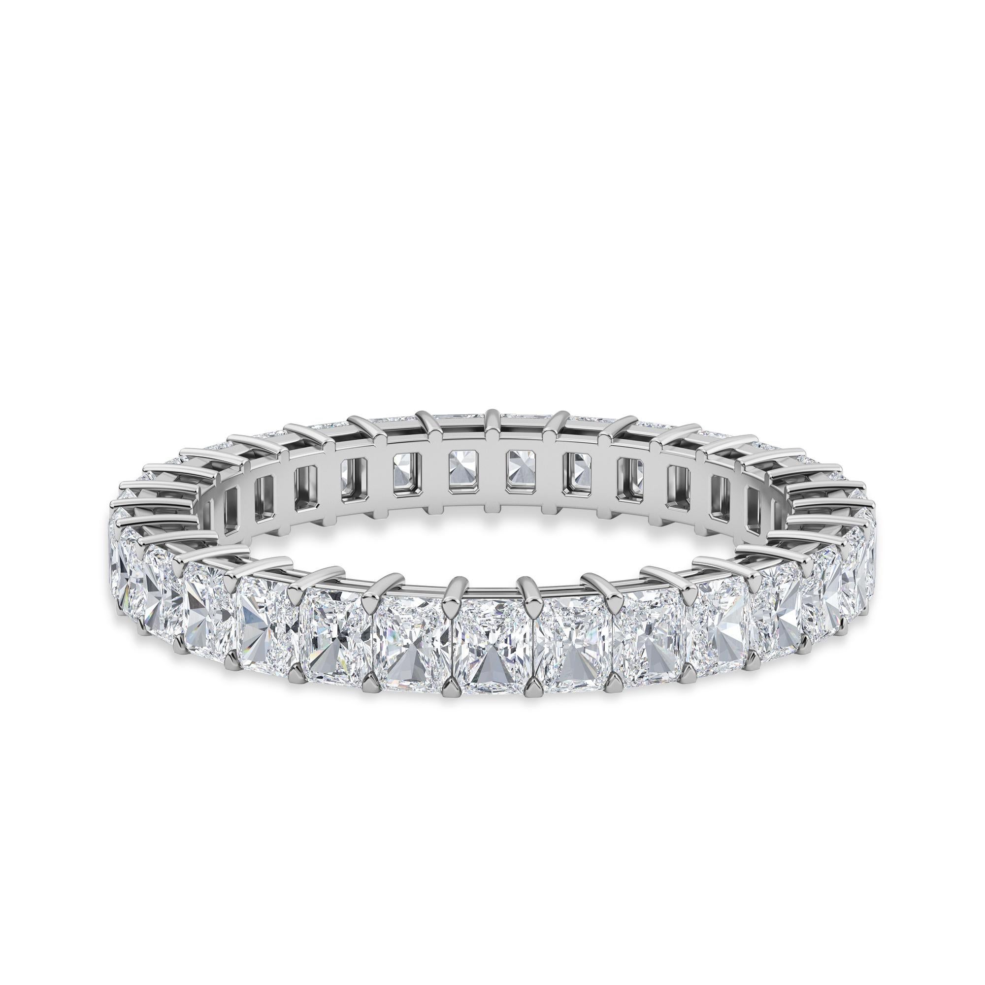 This ring has 31 Cushion Diamonds. The ring has a total carat weight of 1.92.
The diamonds are F color VS clarity. The ring is a finger size 6.25 and is set in platinum.