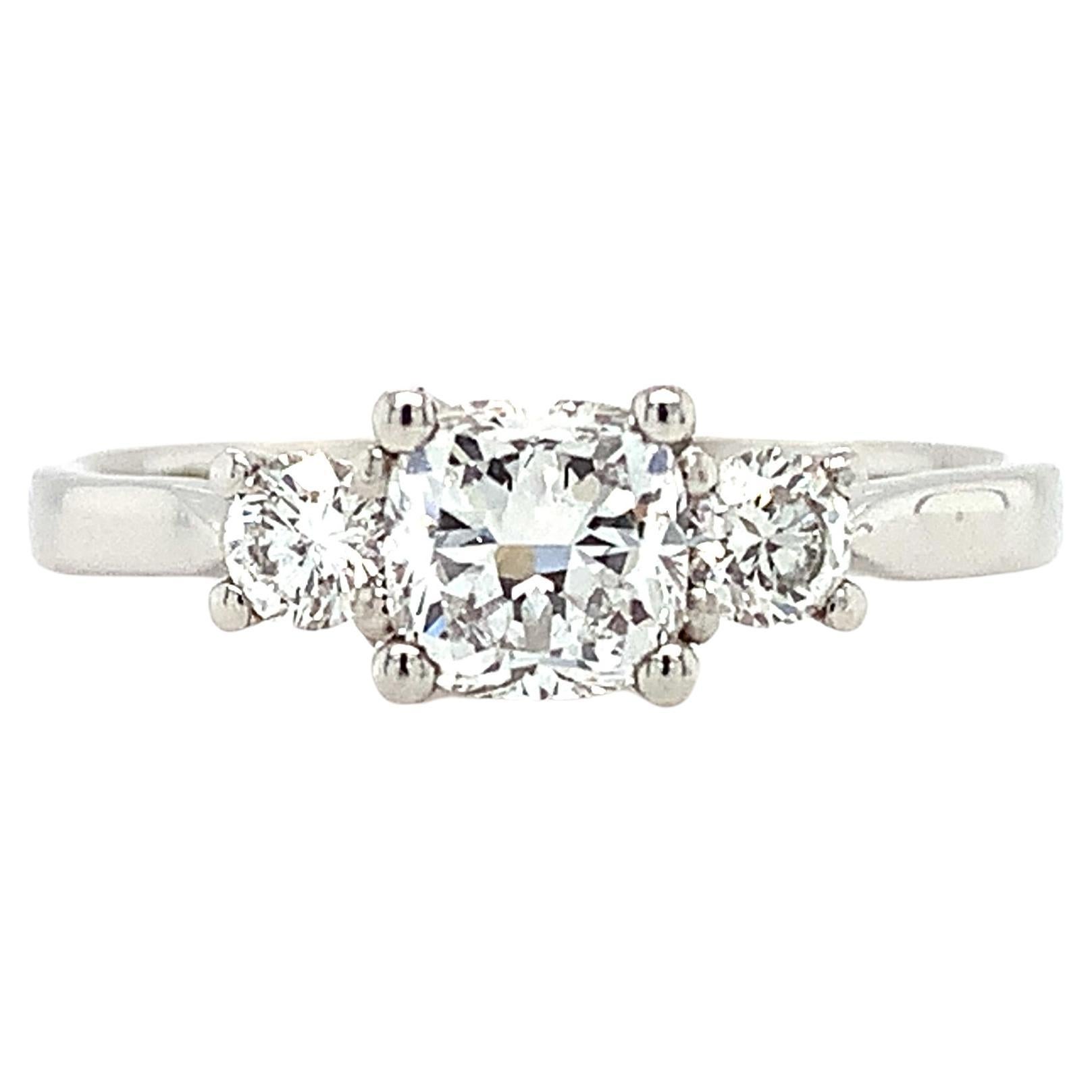 Cushion diamond GIA trilogy three stone engagement ring platinum