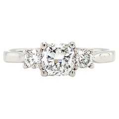Cushion diamond GIA trilogy three stone engagement ring platinum