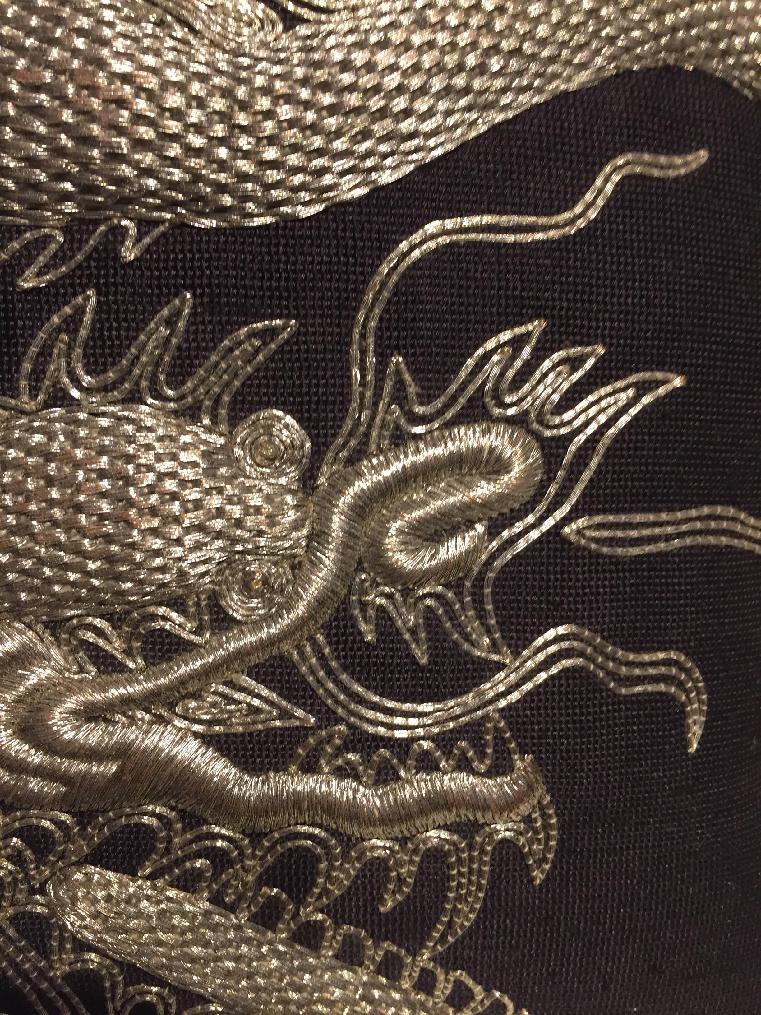 Cushion with Dragon Design, Hand Embroidery with silver thread hand woven on the front panel, back side plain silk, base fabric silk bruno triplet # 68, Hand Woven Silk, colour Jet Black , size 50x50cm, cushion cover with cotton lining and concealed