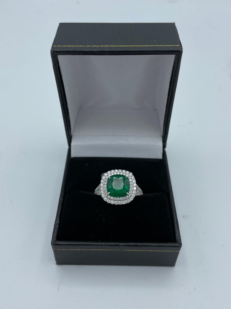 Contemporary Cushion Emerald Ring with Diamond Halo and Band For Sale