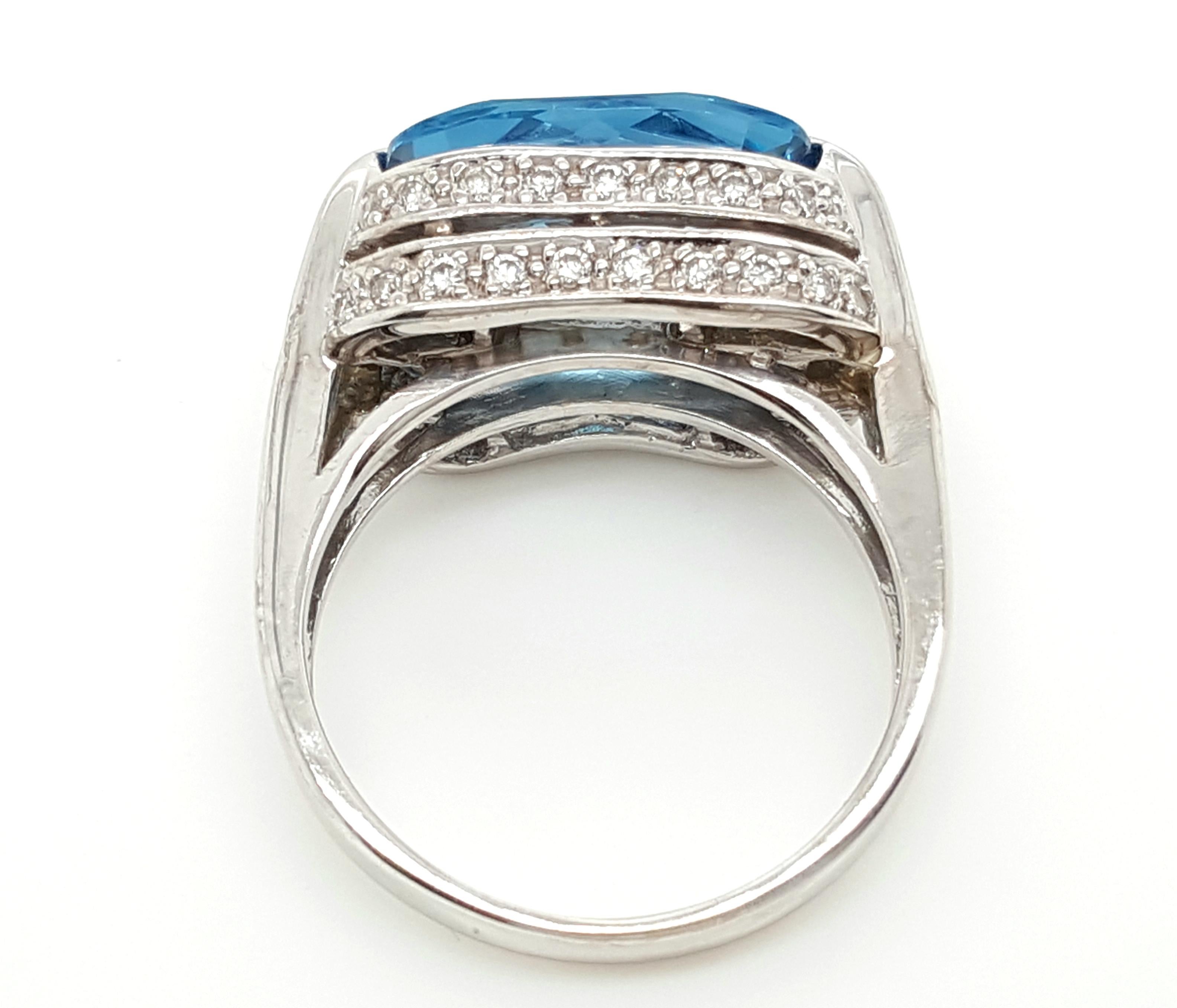 Contemporary Cushion London Blue Topaz and Diamond Cocktail Ring in 14 Karat White Gold For Sale
