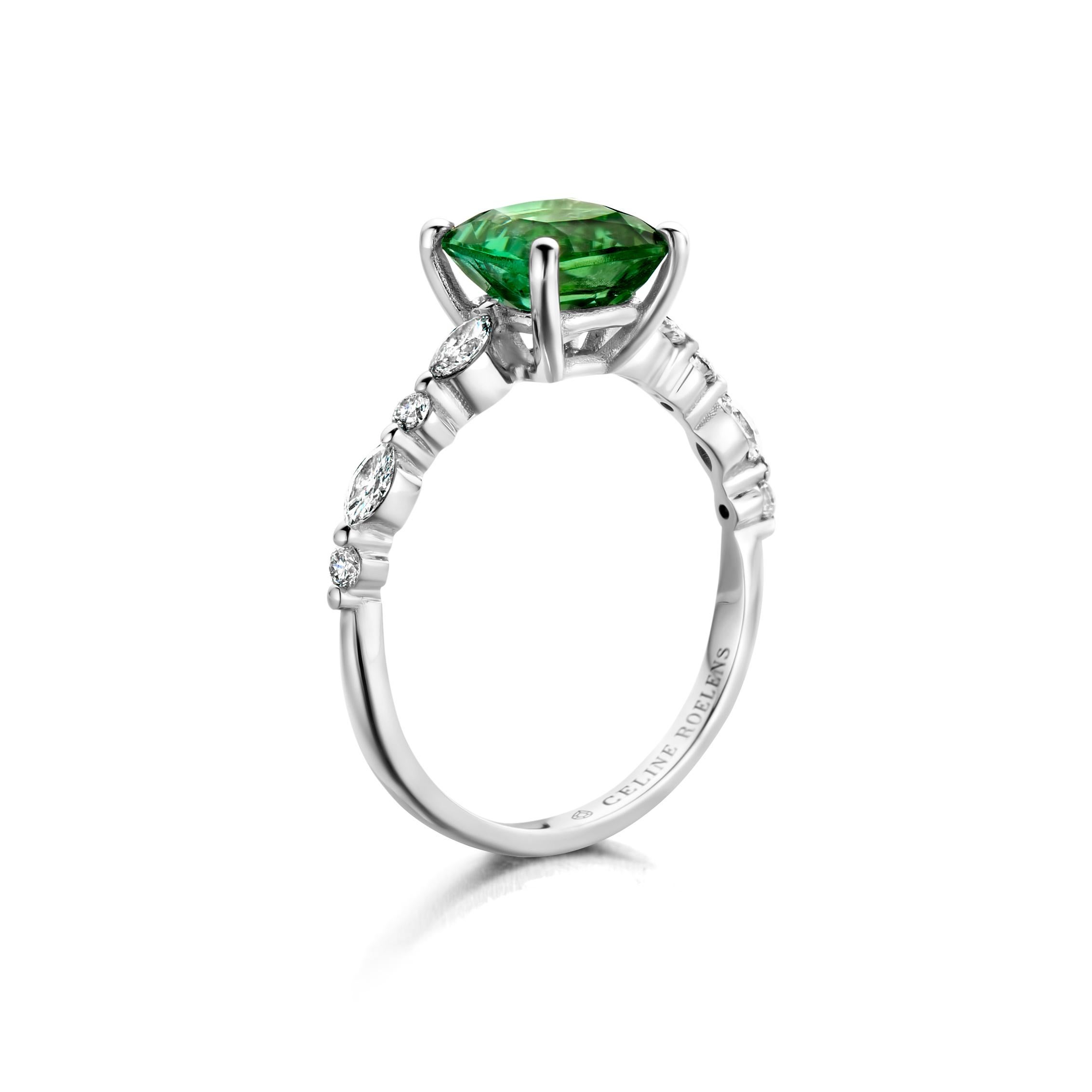 18-karat white gold engagement ring set with one eye clean cushion cut Mint tourmaline, four brilliant cut diamonds and four marquises cut natural diamonds in VS-FG quality. 

Celine Roelens, a goldsmith and gemologist, is specialized in unique,