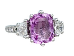 Cushion Pink Sapphire and Half Moon Diamond Three-Stone Ring Set in Platinum