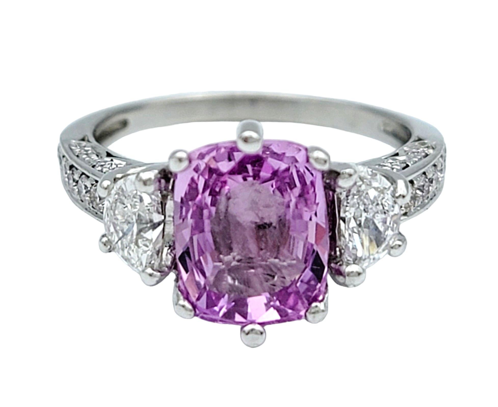 Contemporary Cushion Pink Sapphire and Half Moon Diamond Three-Stone Ring Set in Platinum For Sale