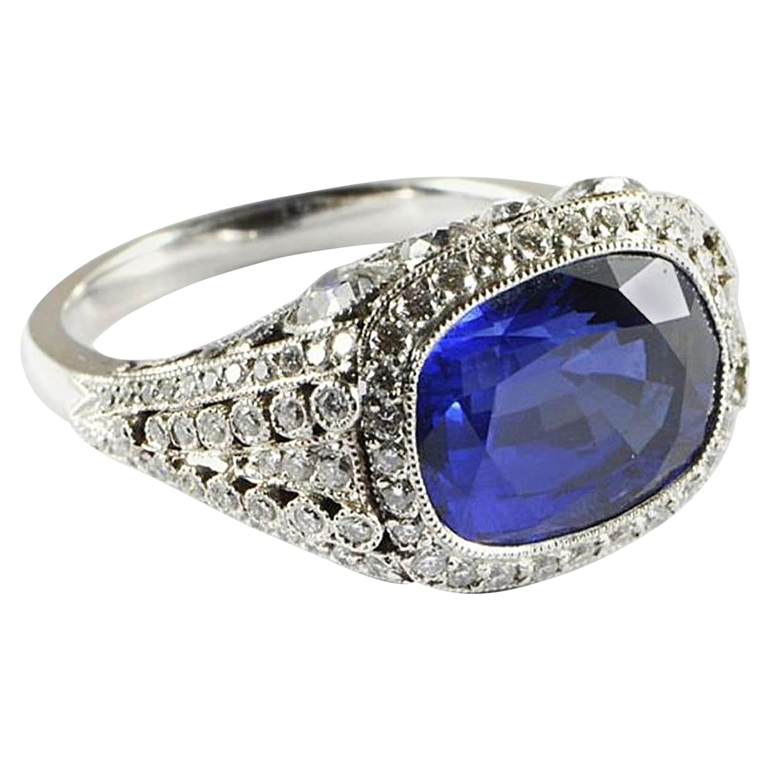 Cushion Sapphire 8.64 Carat and Diamond Platinum Ring For Sale