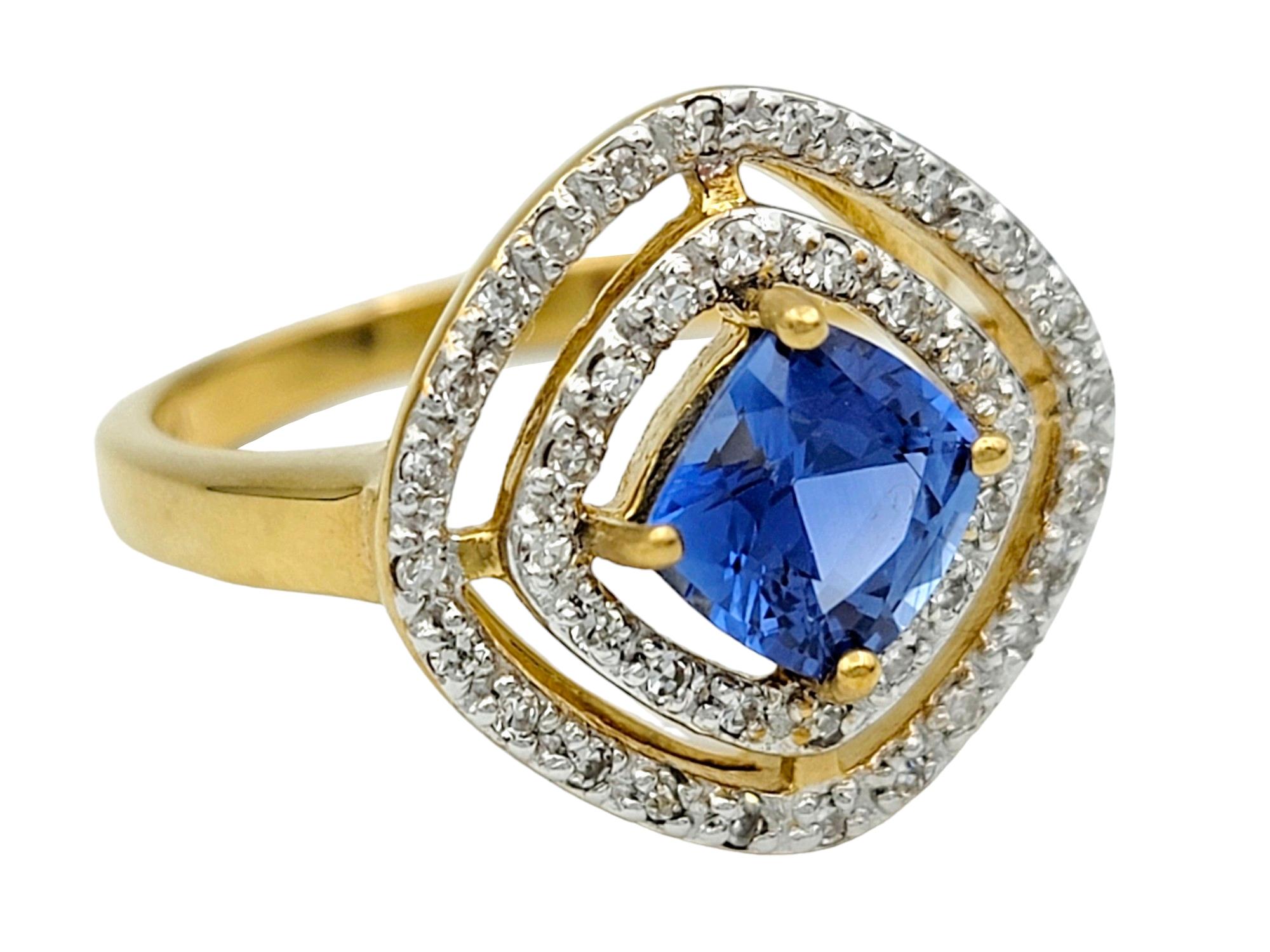 Contemporary Cushion Sapphire and Double Diamond Halo Cocktail Ring in 18 Karat Yellow Gold For Sale