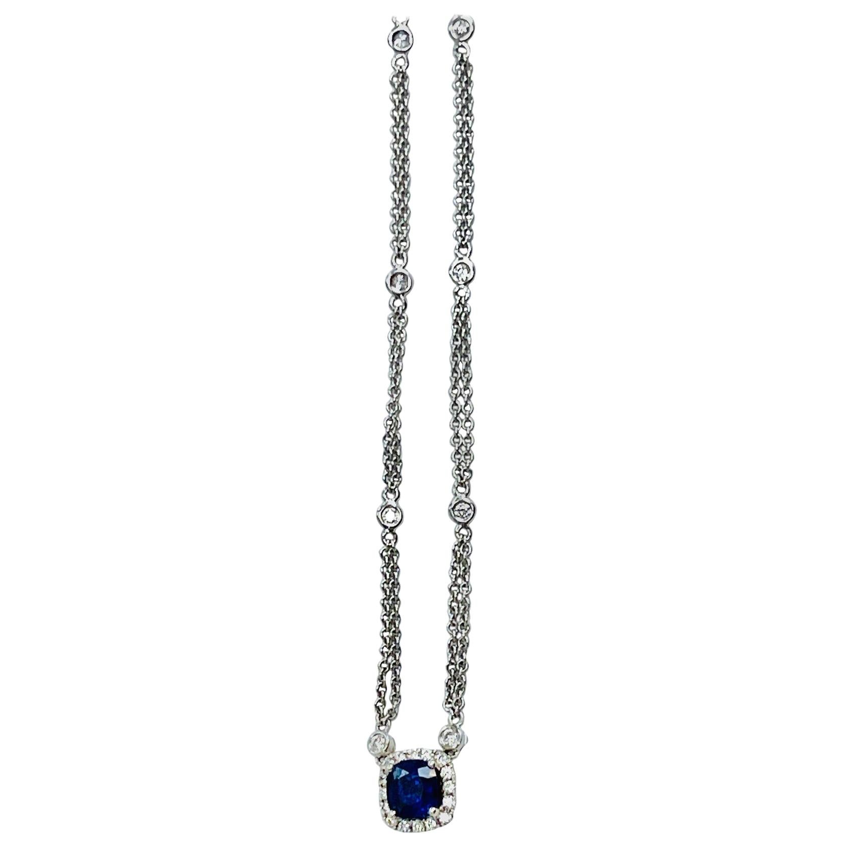 1.05 Carat Cushion Sapphire set in 18k white gold pendant/ necklace with 0.19 carat diamond.