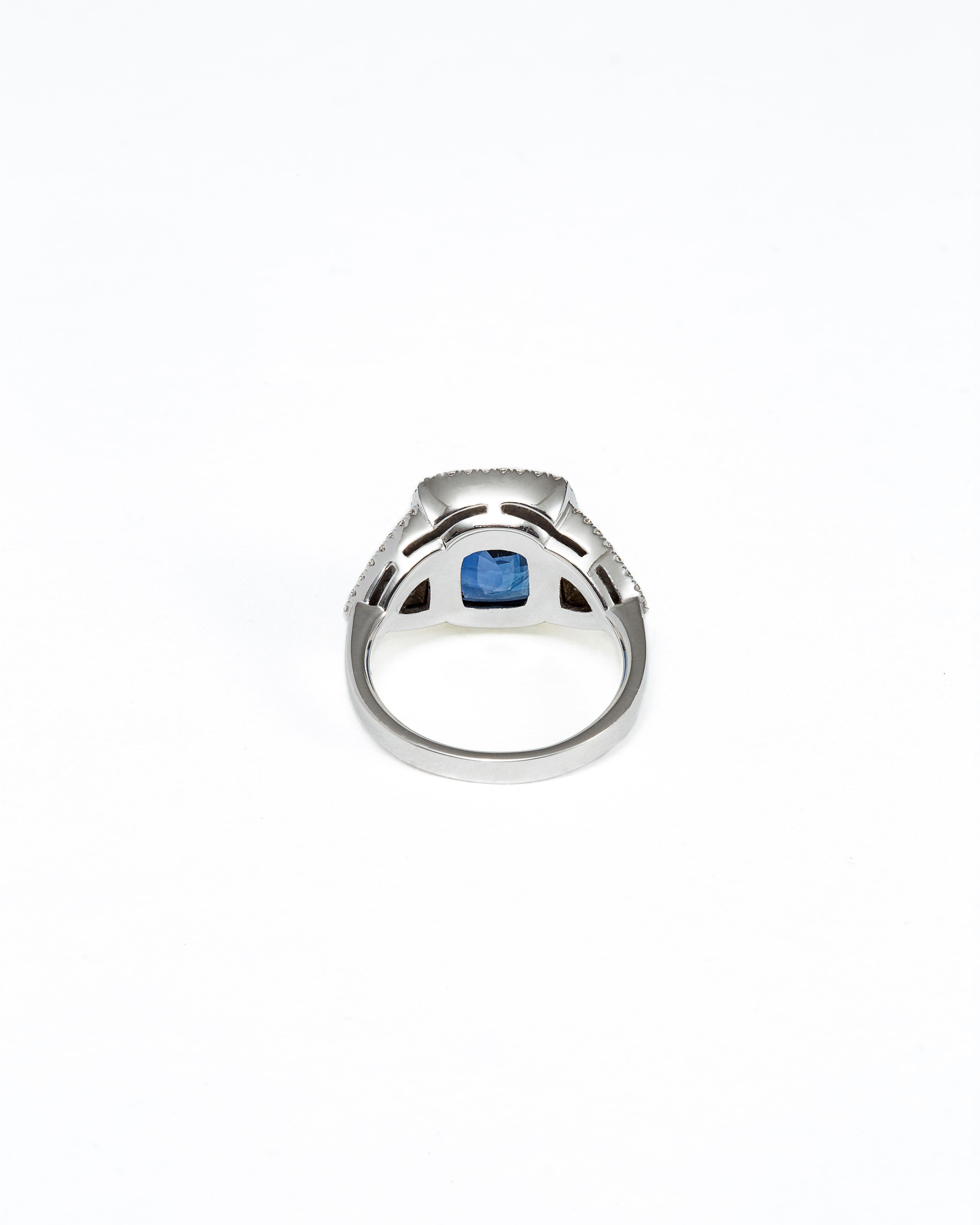 Modern Cushion Shape 6.50 Carats Deep Blue Ceylon Sapphire and Diamond Ring For Sale