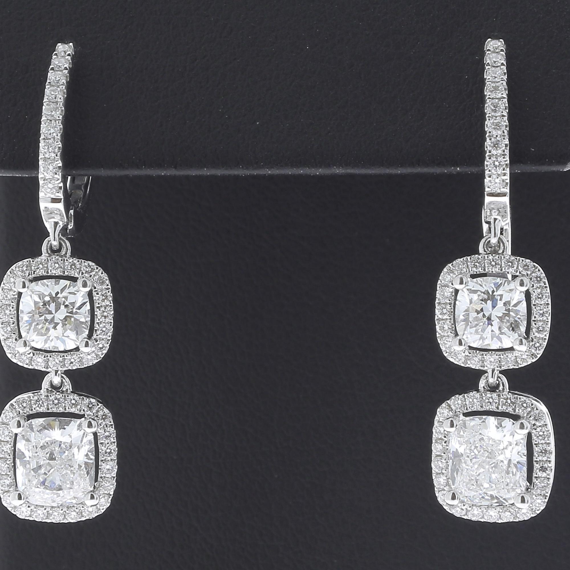 Discover our wonderful Diamond cushion earrings.
The earrings are set with 4 cushion shape diamonds weighing 3.02 Carats.
1 Cushion weighing 0.50 Carats Color Grade F Clarity Grade VS2 
(GIA REPORT 2165702180)
1 Cushion weighing 0.50 Carats Color