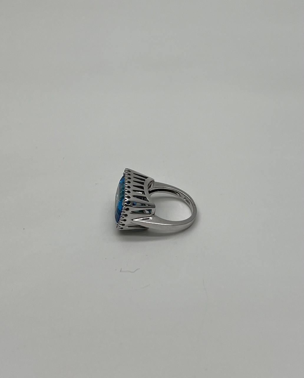 Modern Cushion Shape Swiss Blue Topaz Diamonds Halo Jumbo 14K White Gold Cocktail Ring For Sale