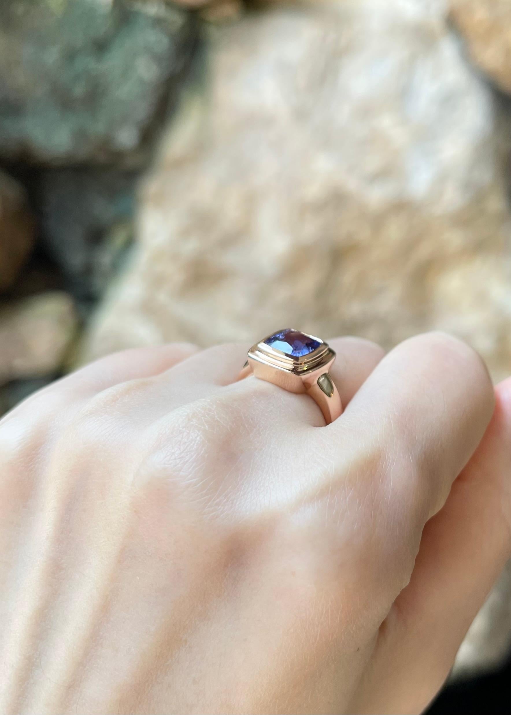 Women's Cushion Shape Tanzanite Ring set in 18K Rose Gold Settings For Sale
