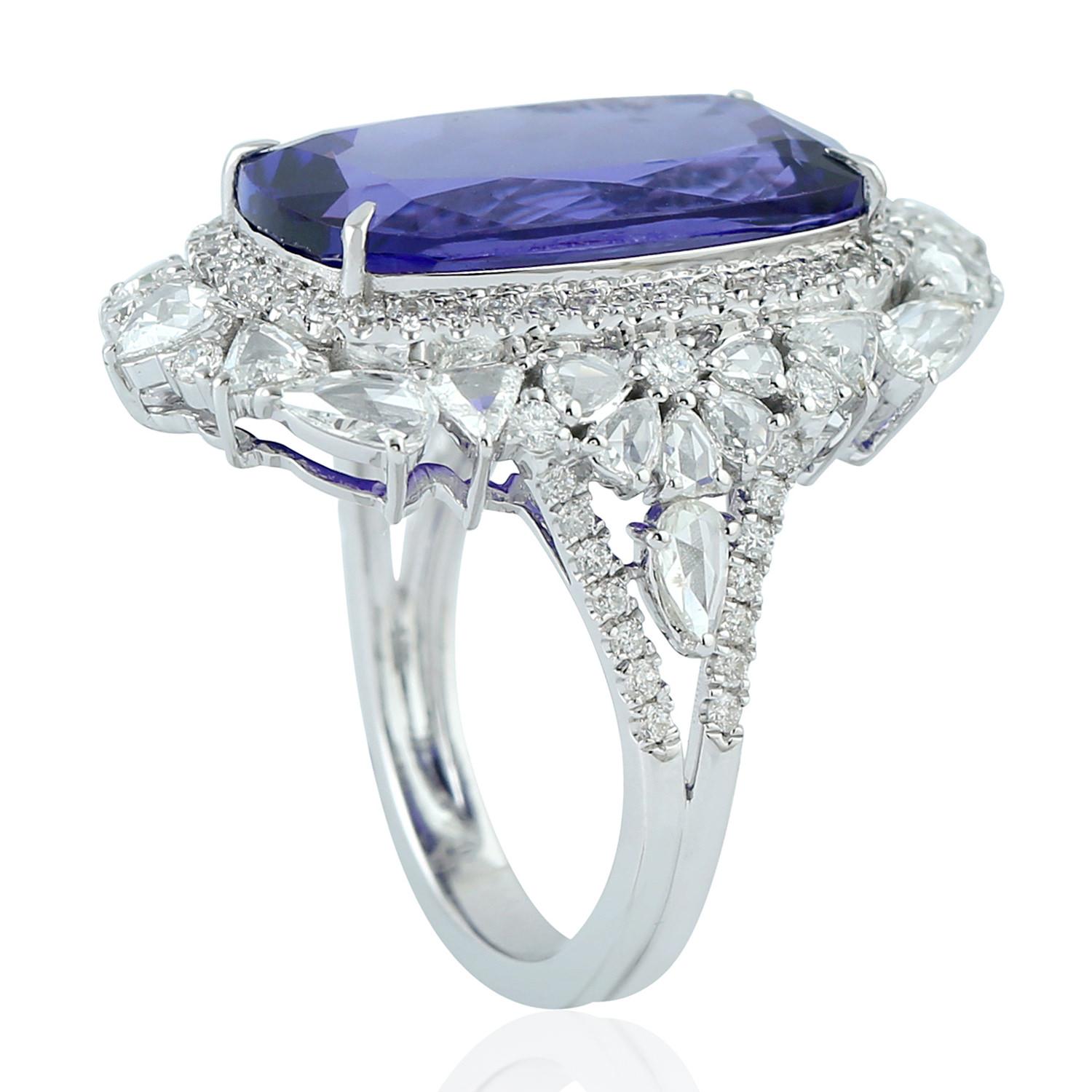 Stunning this Cushion Shape Tanzanite Ring with White Diamonds in 18K white Gold is like from dreams, it sits perfectly on the finger.

Ring Size: 7 ( can be sized for a cost )

18KT: 8.051gms
Diamond: 2.10ct
Tanzanite: 14.21ct