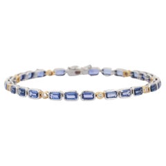 Cushion Shaped Blue Sapphire Tennis Bracelet in 18K White Gold with Diamonds