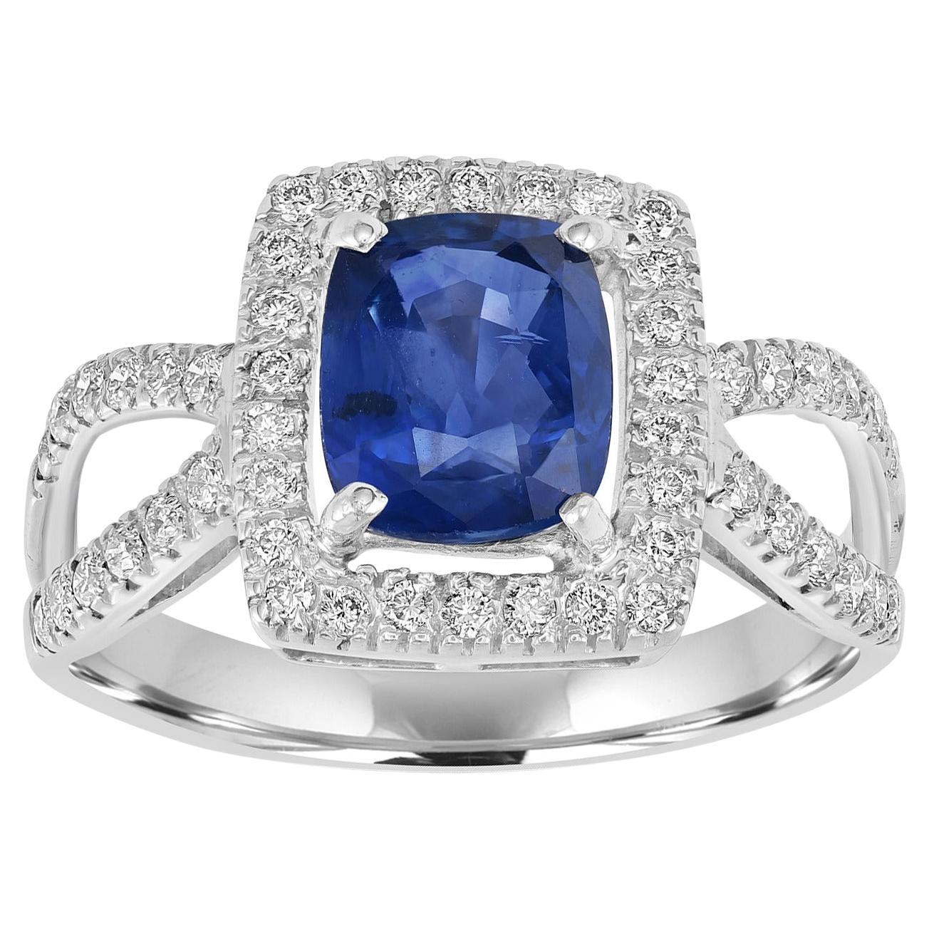 Bague en or blanc 18k avec saphir bleu de Ceylan en forme de coussin et diamants