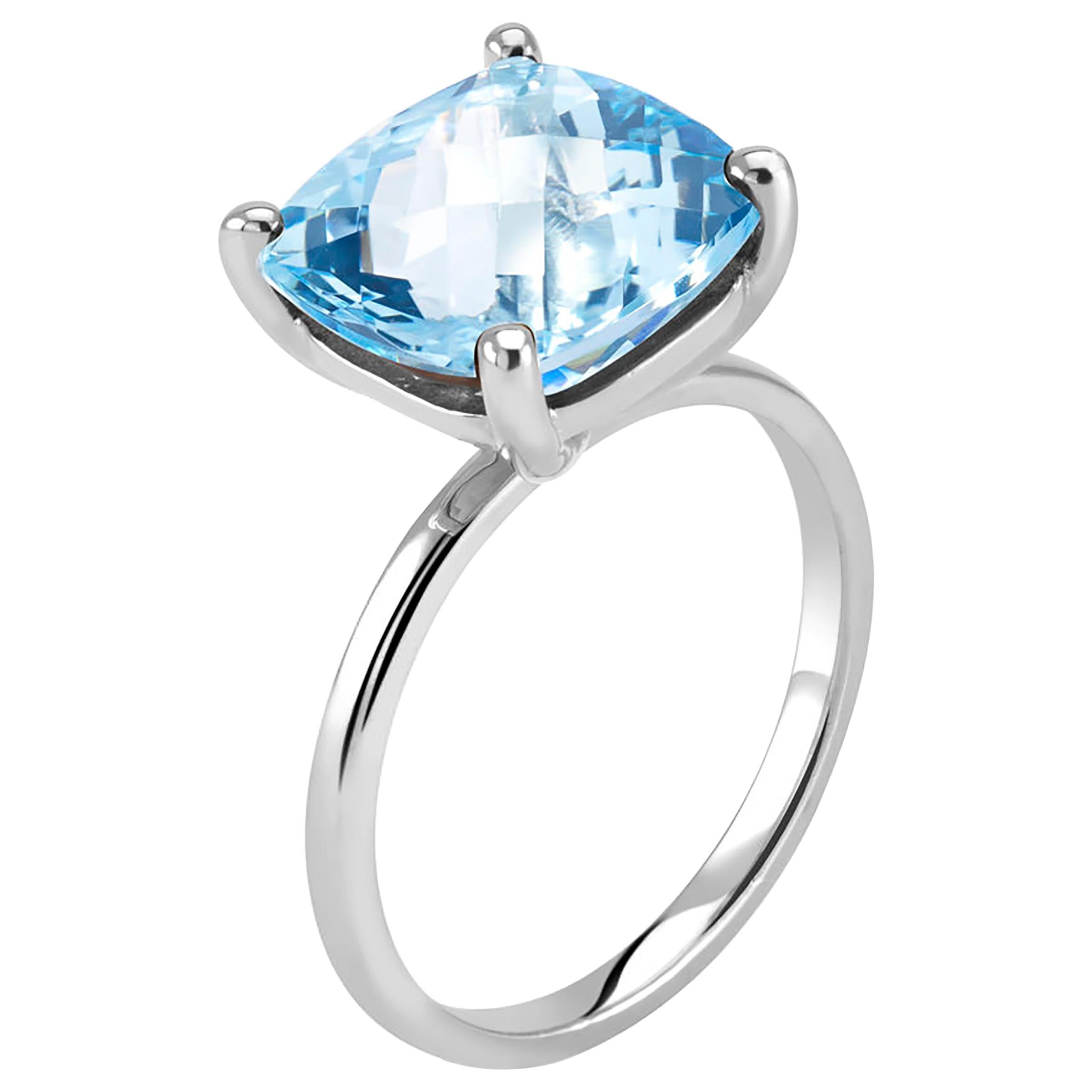 Cushion Shaped Four Carat Blue Topaz Solitaire Sterling Silver Ring