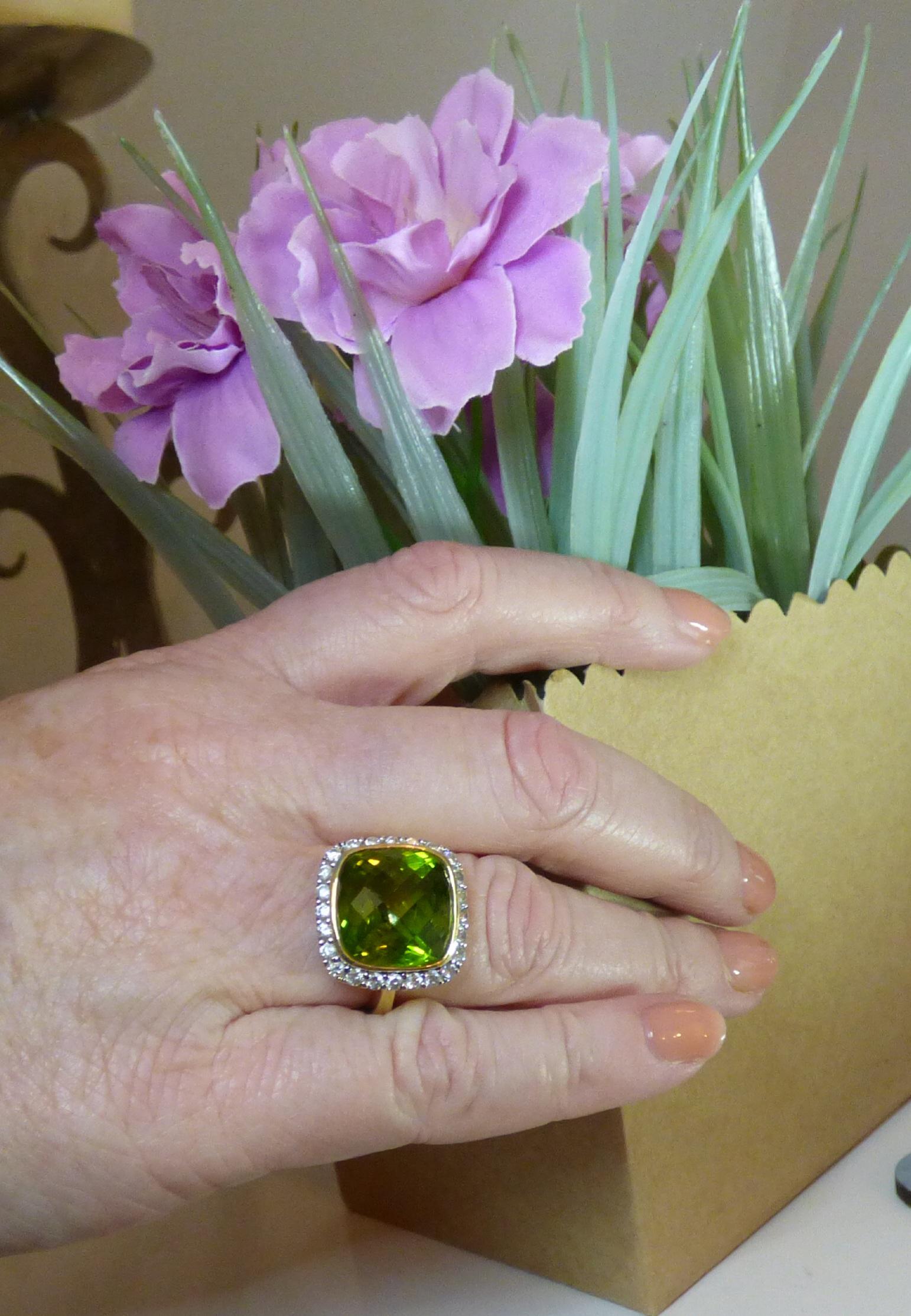 Contemporary Cushion Shaped Peridot '9.22ct.' and Diamond Cluster Ring in 18k Yellow Gold For Sale