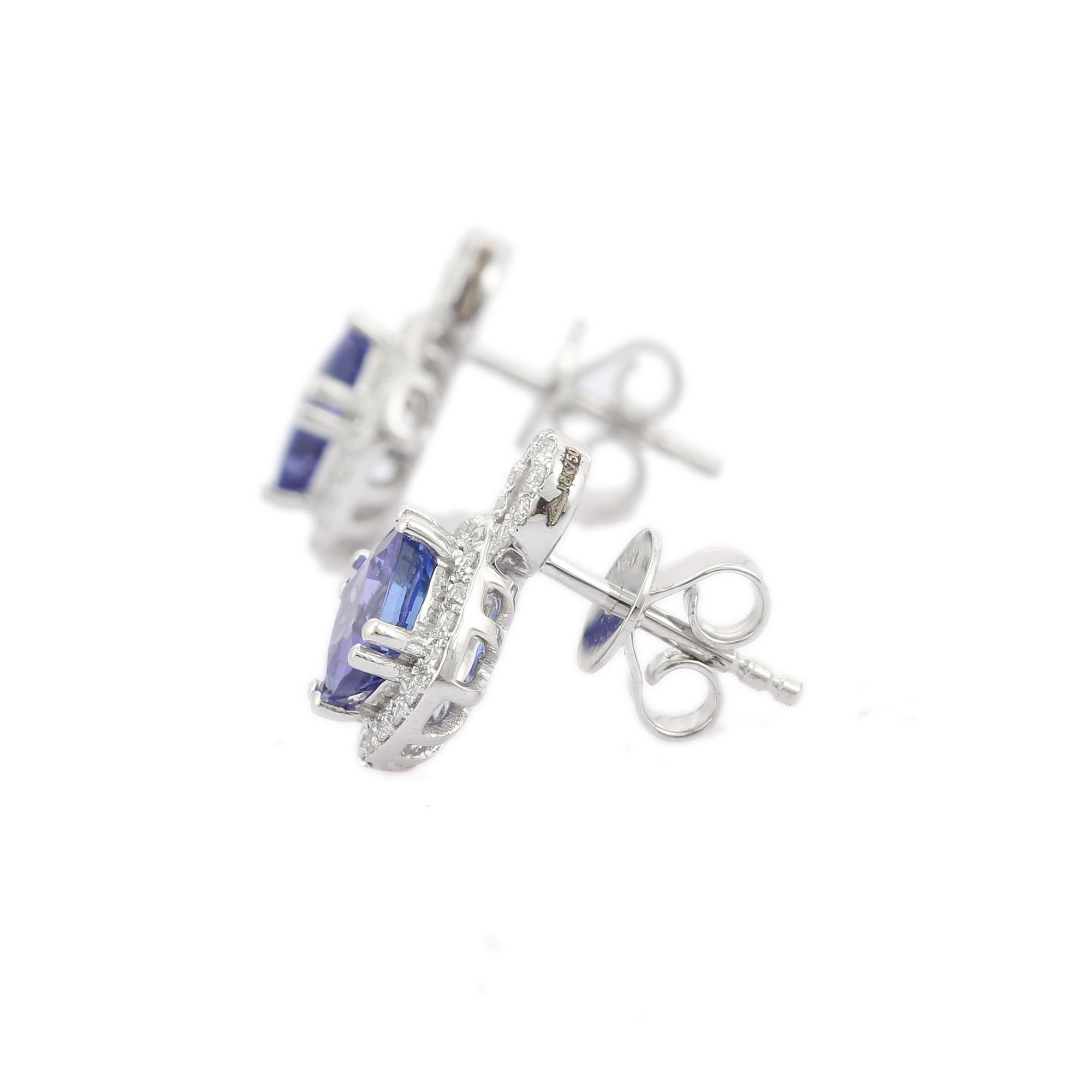 Women's Cushion Shaped Tanzanite Stud Earrings with Diamonds in 18K White Gold For Sale