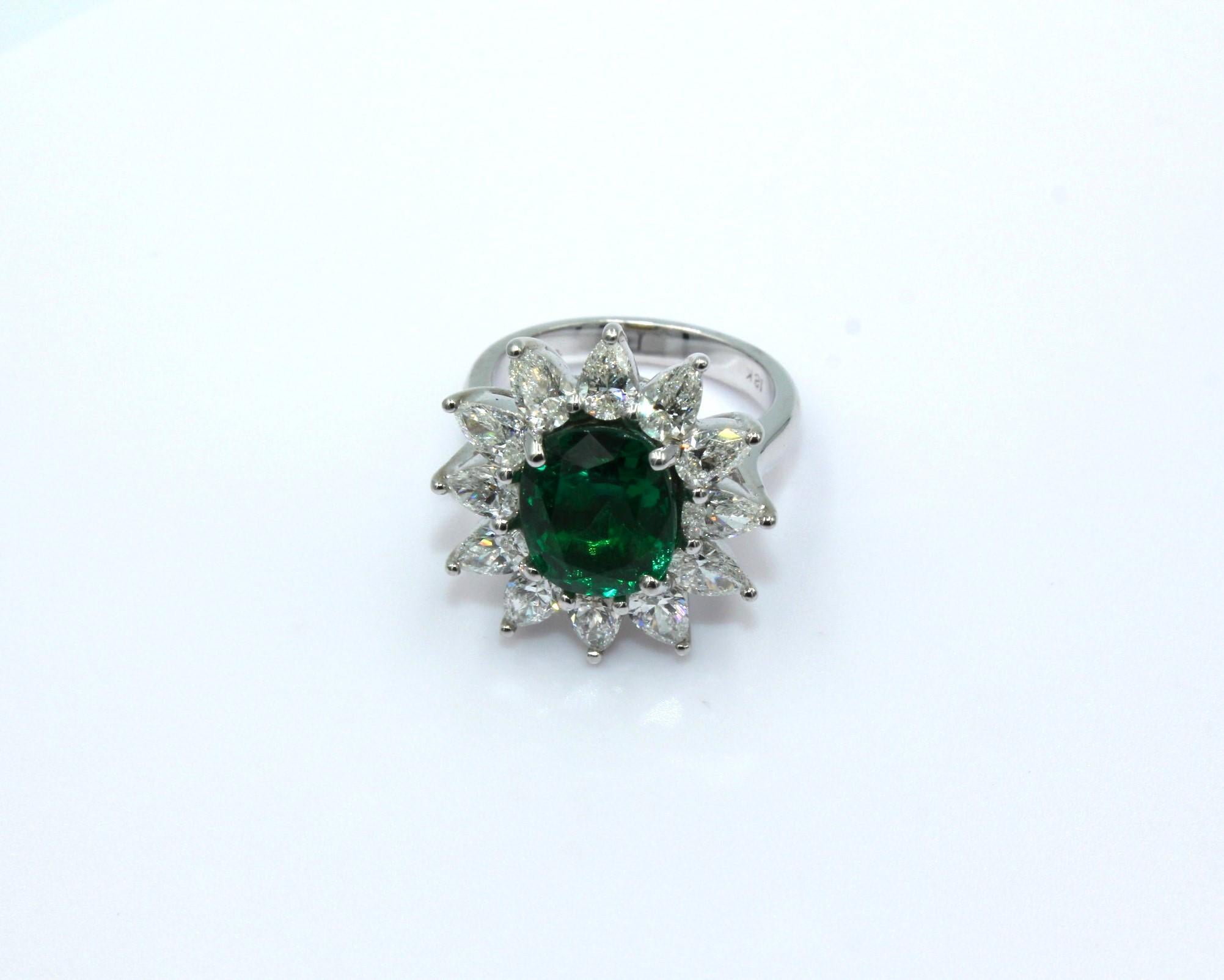 3.54 Carats Cushion Zambian Emerald and twelve 0.1991 Carats Pear Shaped Diamonds.

The perfect statement piece to highlight your unique elegant taste for fine jewelry.

*Lab Certificate is available upon request*

Item Details:
- Type: Ring
-
