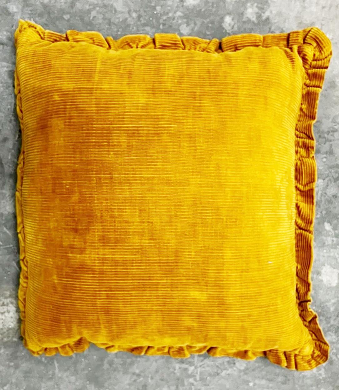 Mustard colored velvet cushions and tapestry. First half of the 20th century.

 They have a very elaborate shape, made up of velvet folds and ruffles framing a piece of tapestry in the shape of a floral vase.

 They are mustard yellow striped