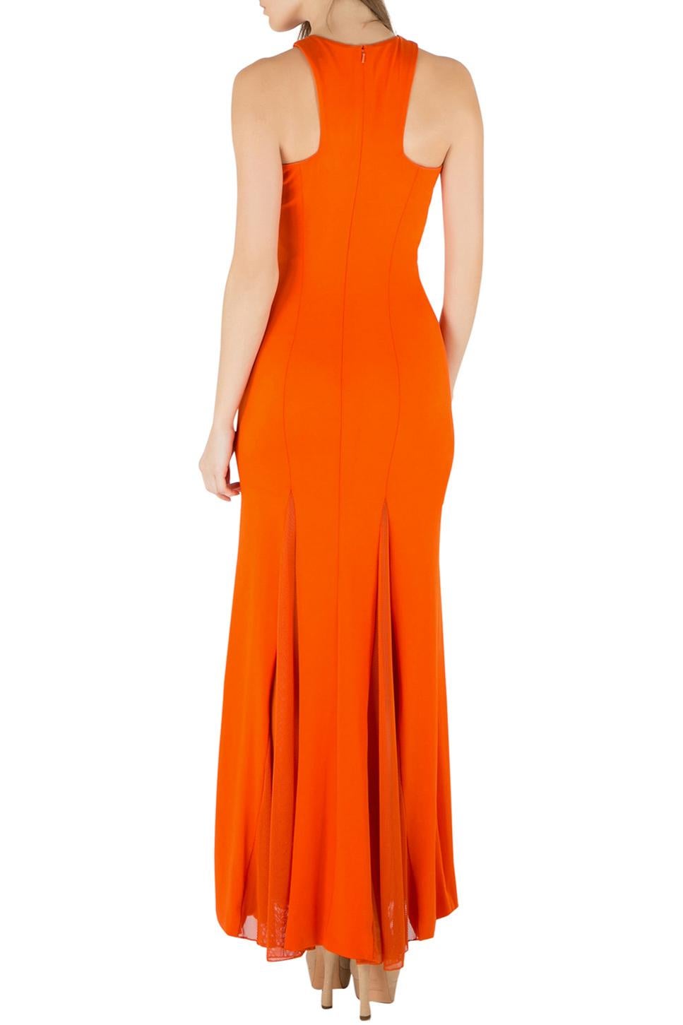 Ditch those traditional mundane dresses and go for a glam, statement-making style with this Cushnie Et Ochs gown. Made from fine quality materials, the gown has mesh panels on the sides, a sleeveless silhouette and a lovely orange hue.

Includes: